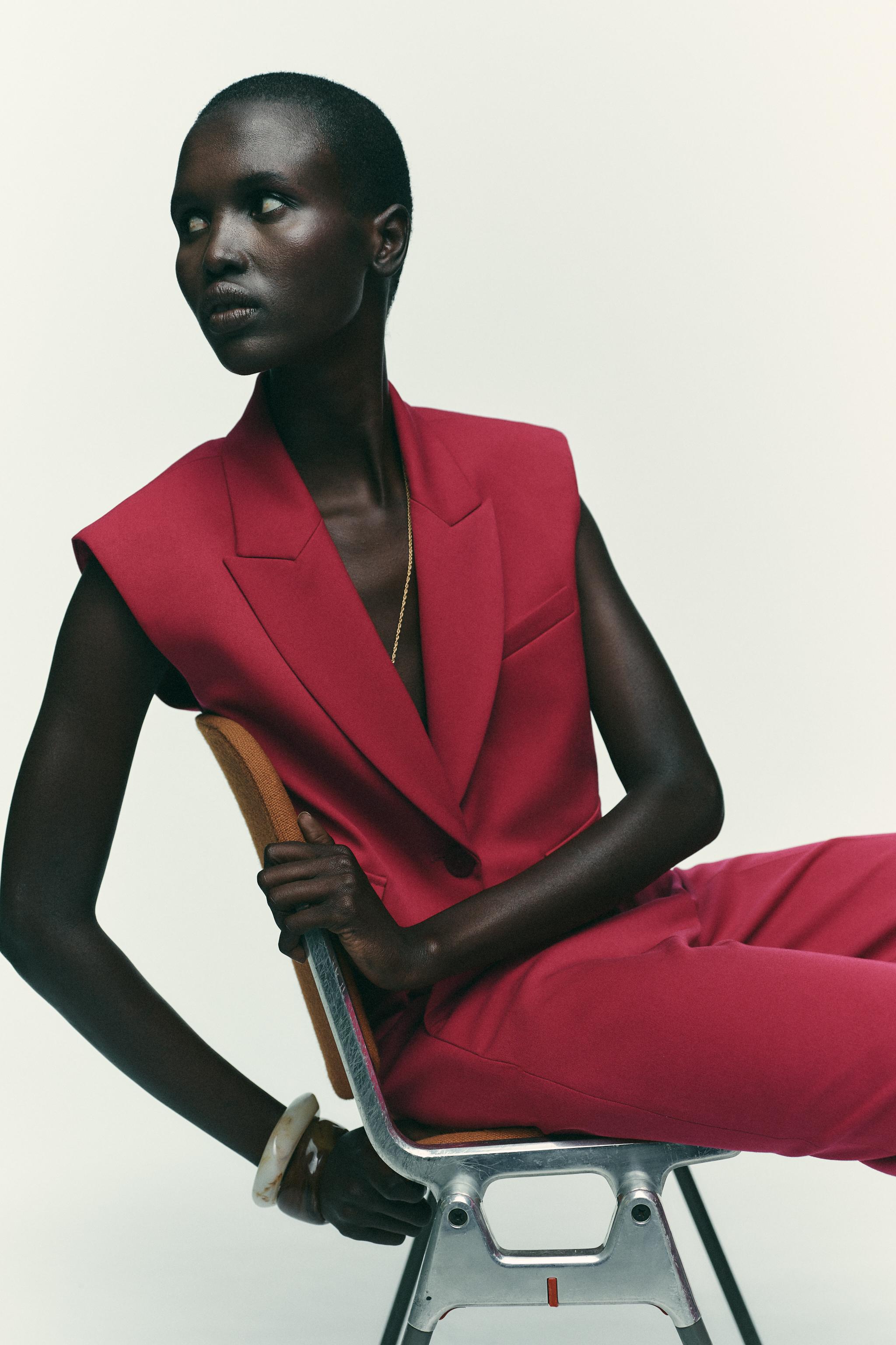 SHORT VEST WITH FLAPS