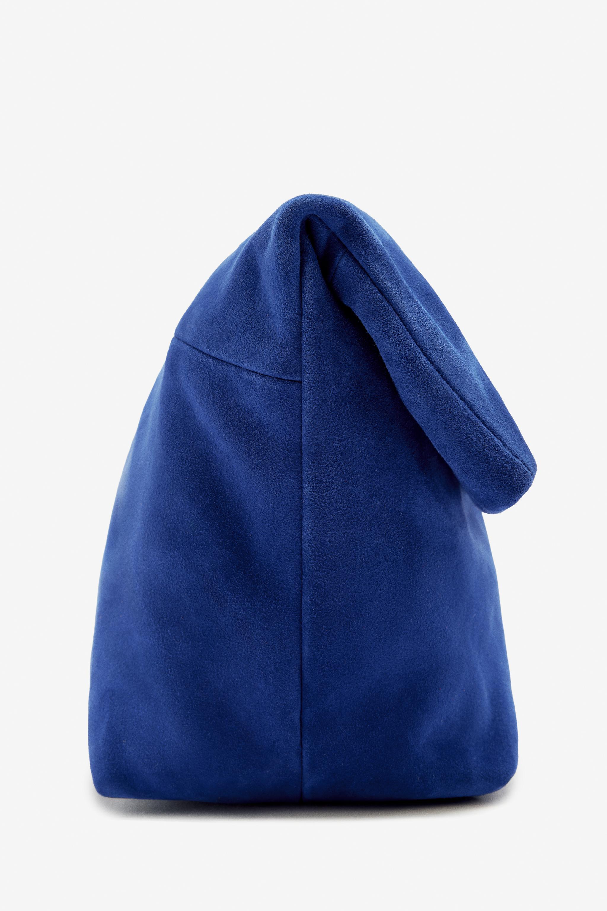 LIMITED EDITION MAXI SUEDE CLUTCH