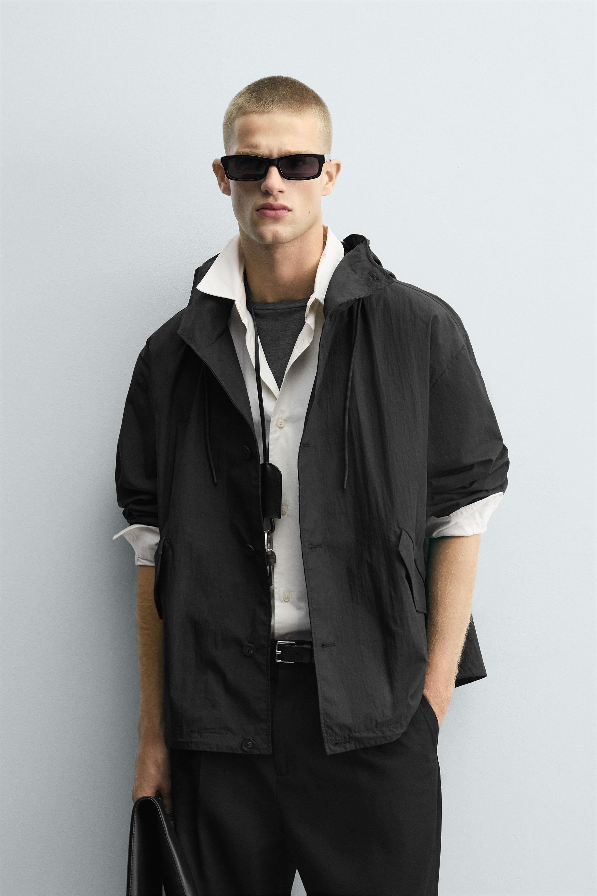 HOODED TECHNICAL JACKET