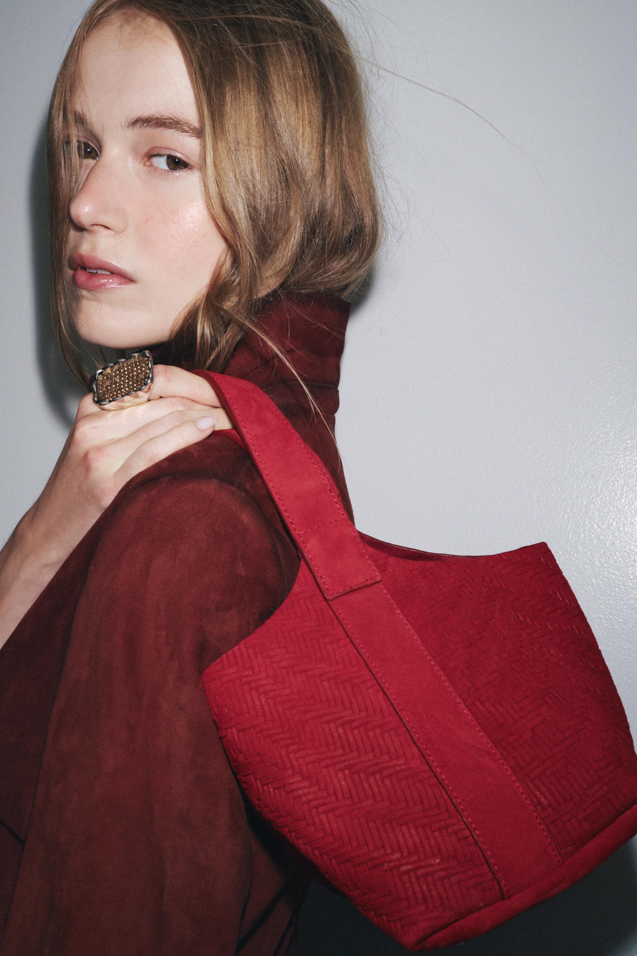 BRAIDED SPLIT LEATHER MINI BUCKET BAG