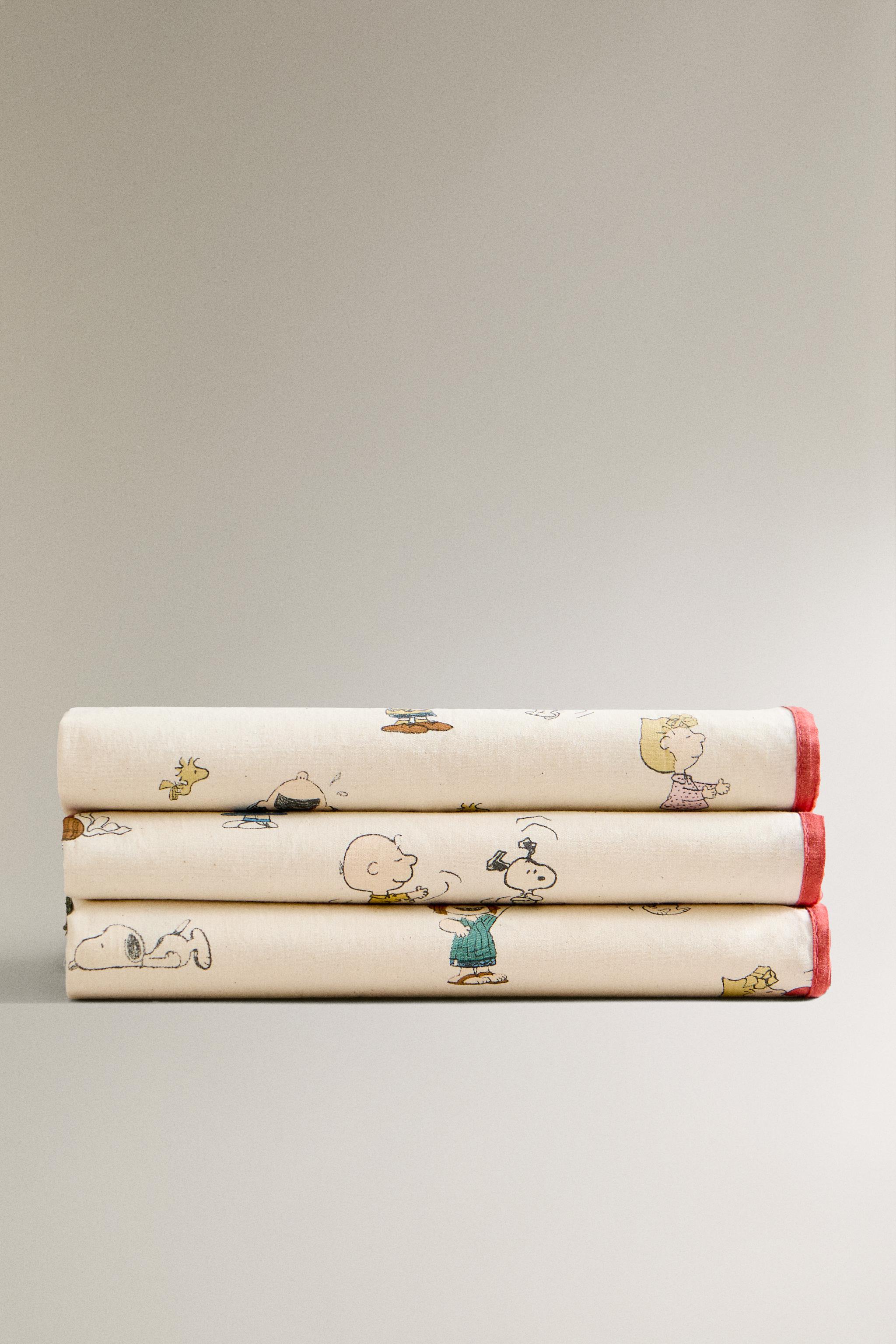 CHILDREN’S PEANUTS™ RESIN-COATED TABLECLOTH