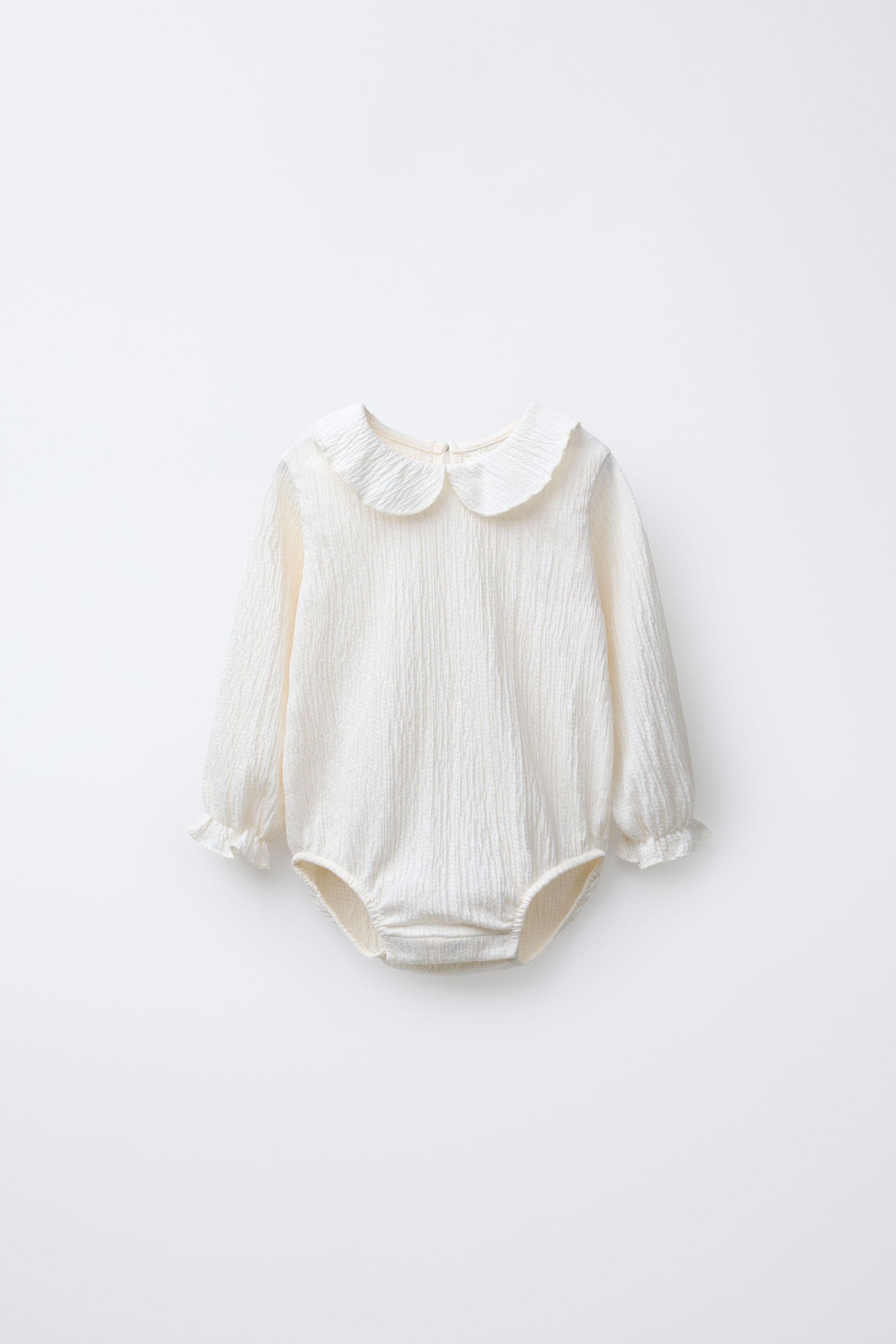 TEXTURED NECK BODYSUIT