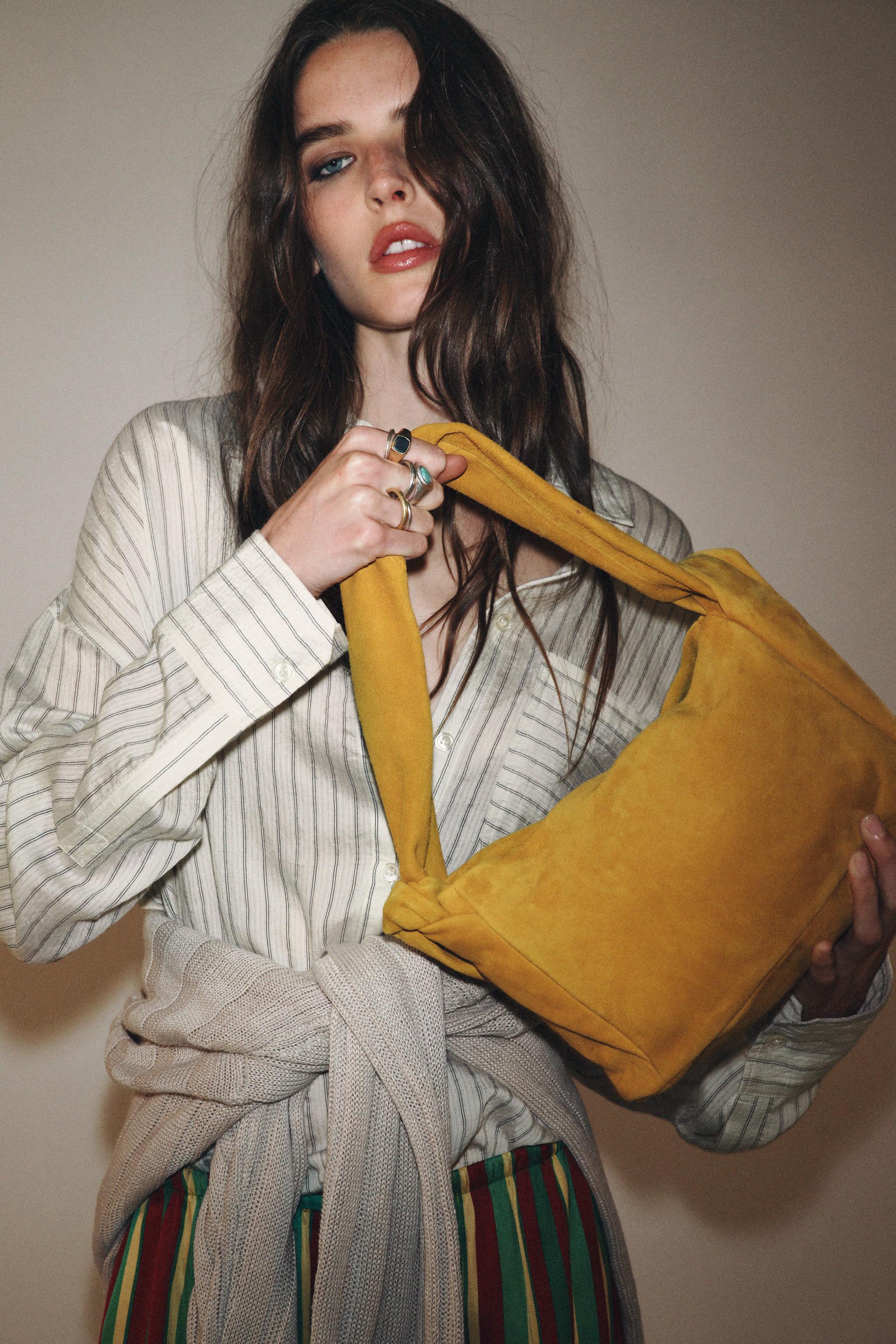 SPLIT LEATHER HANDBAG