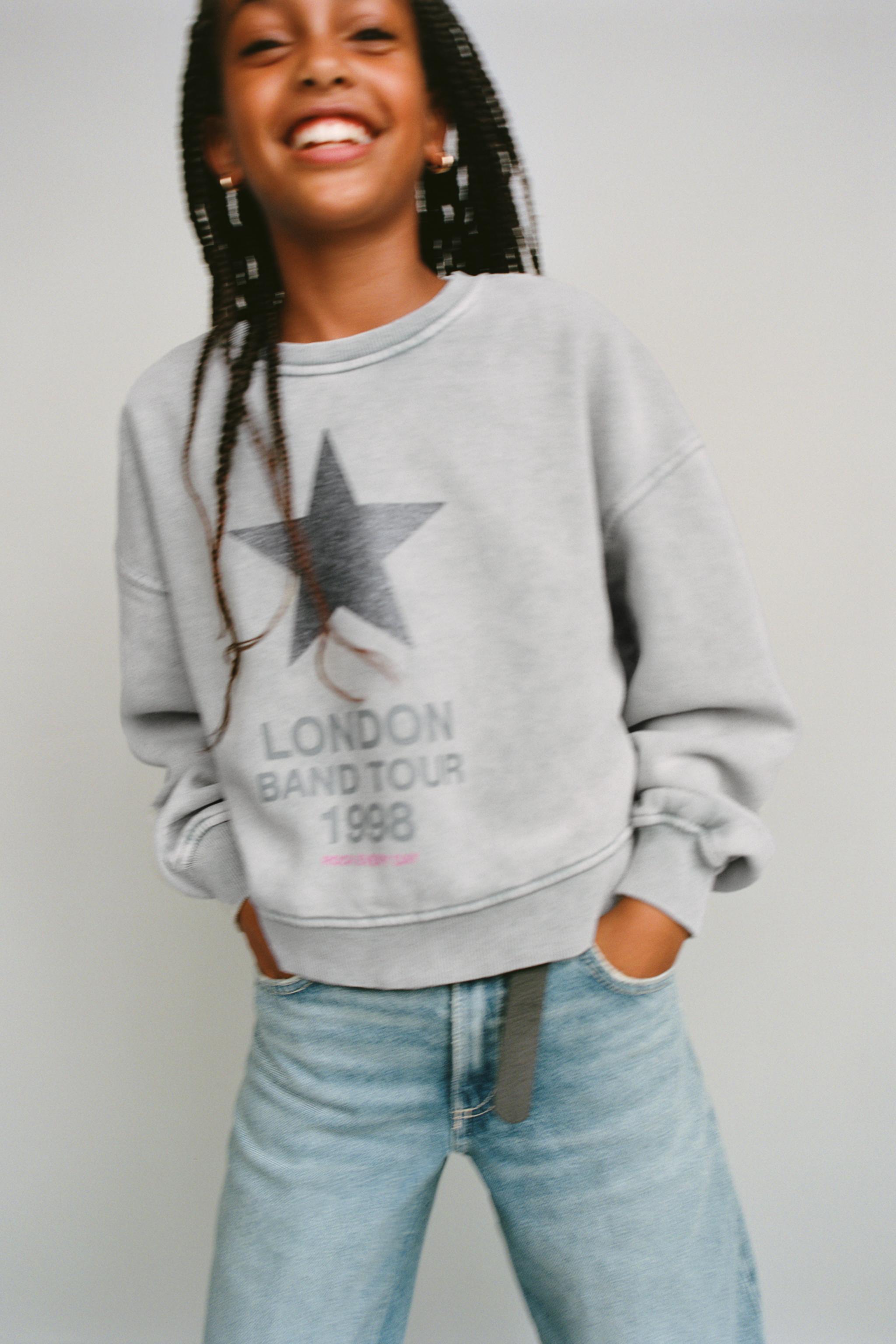 WASHED EFFECT GLITTER STAR SWEATSHIRT
