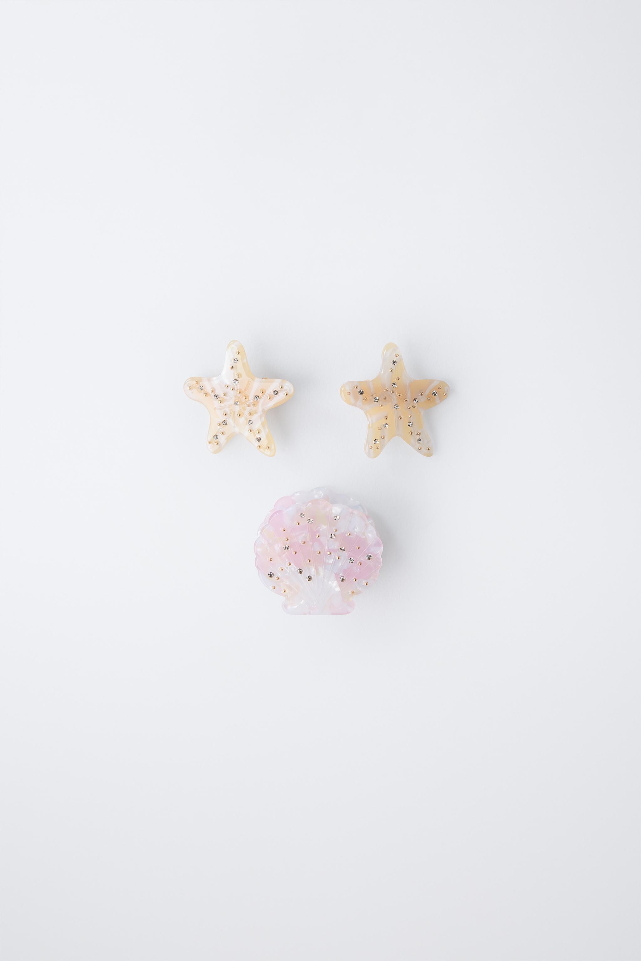 THREE-PACK OF SHELL AND STAR HAIR CLIPS