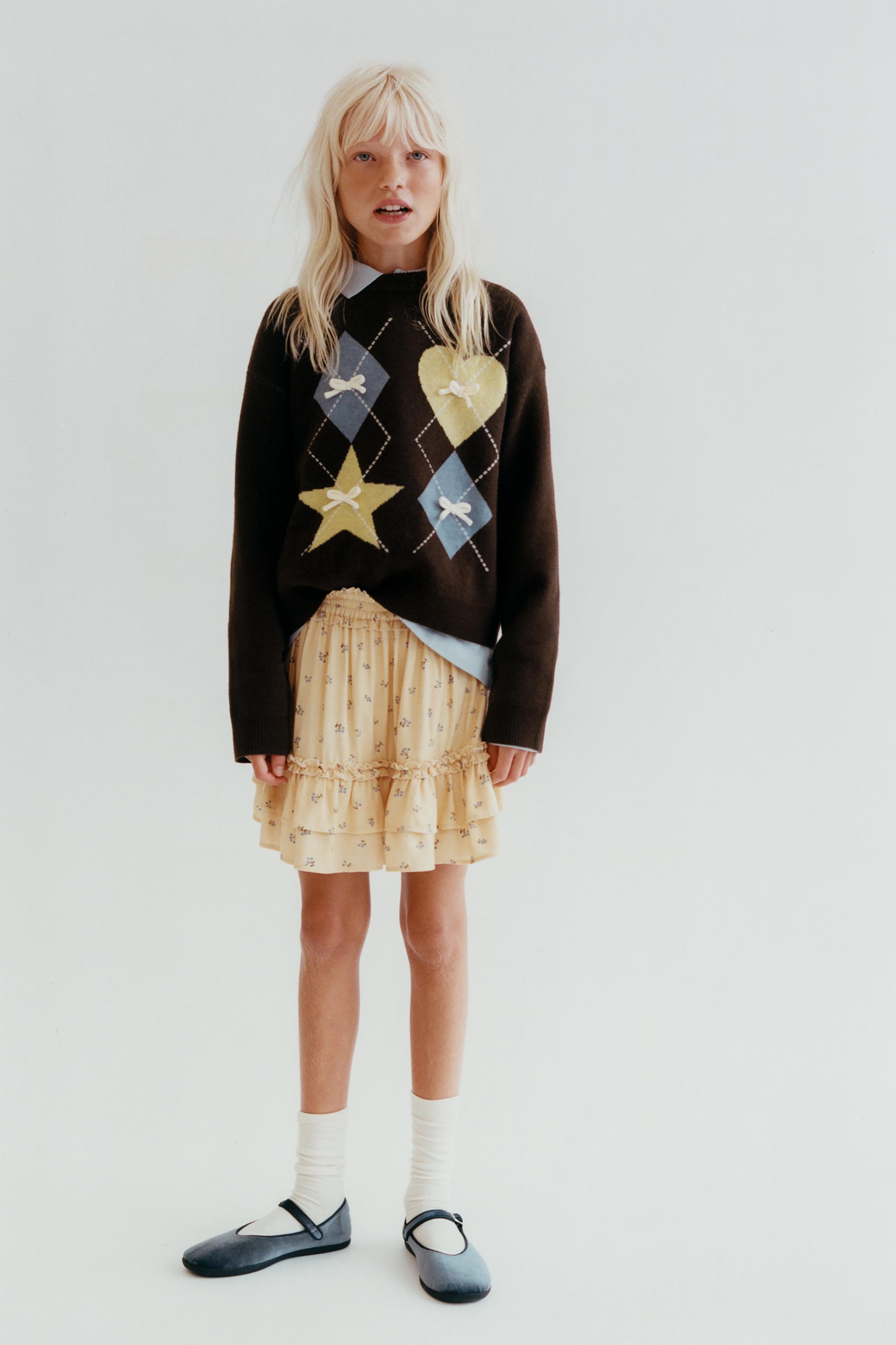 DIAMOND AND BOW KNIT SWEATER