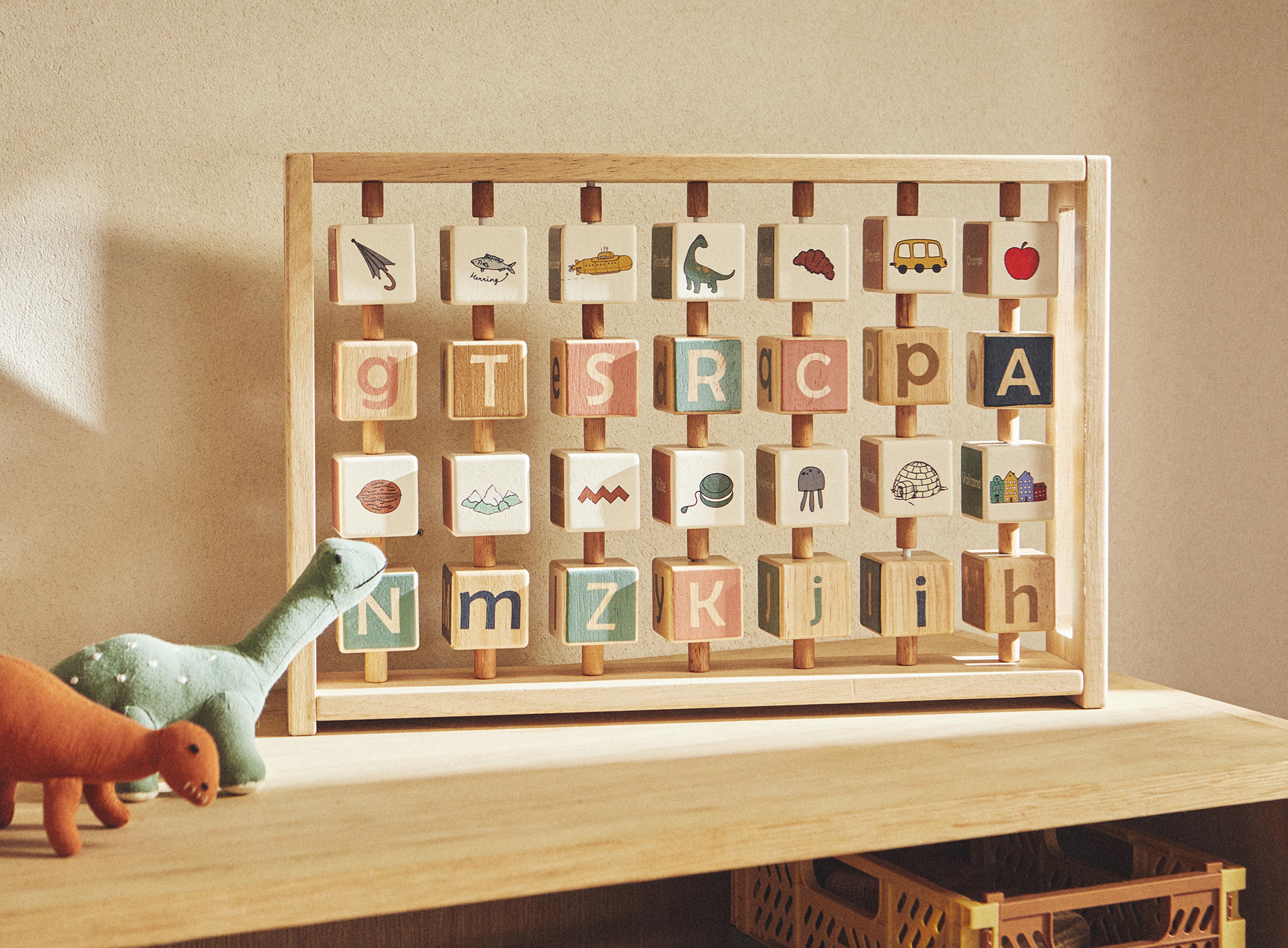 CHILDREN’S WOODEN ALPHABET TOY