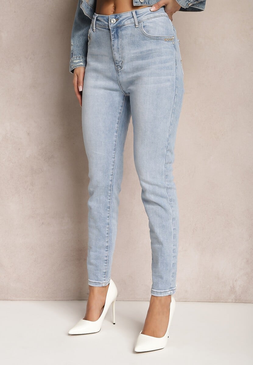Jasnoniebieskie Jeansy Skinny z Subtelnymi Przetarciami i Przeszyciami na Kieszeniach Lenari