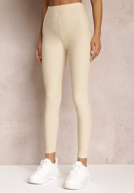 Jasnobeżowe Legginsy Hyraste