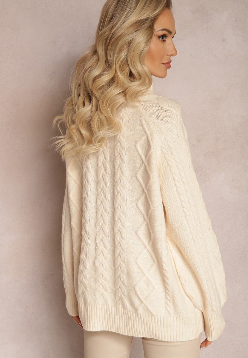 Beżowy Oversizowy Golf w Ozdobny Splot Jupiterra