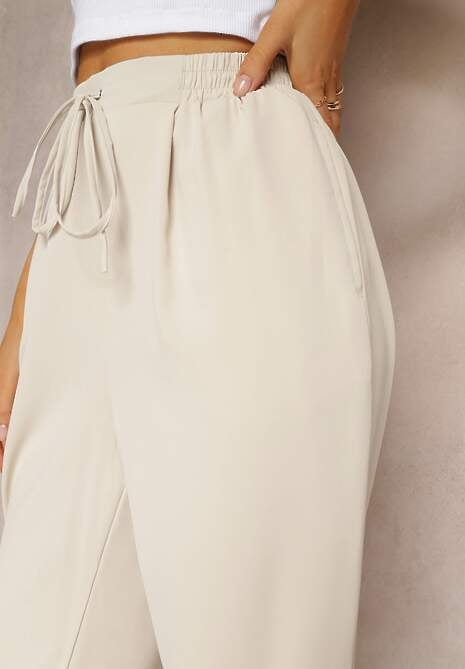 Beżowe Spodnie High Waist z Gumką i Troczkiem w Pasie oraz Kieszeniami Arlettia