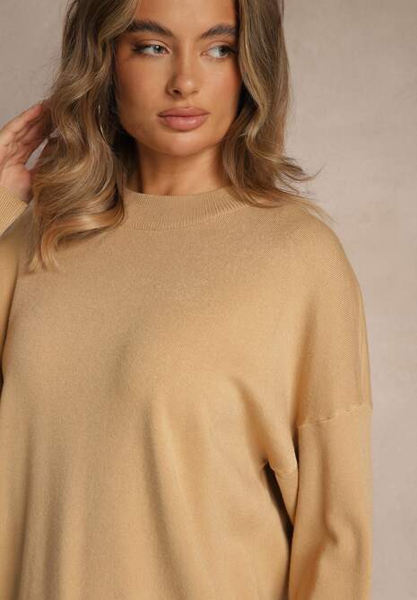 Beżowy Nietoperzowy Sweter w Minimalistycznym Stylu Raliava