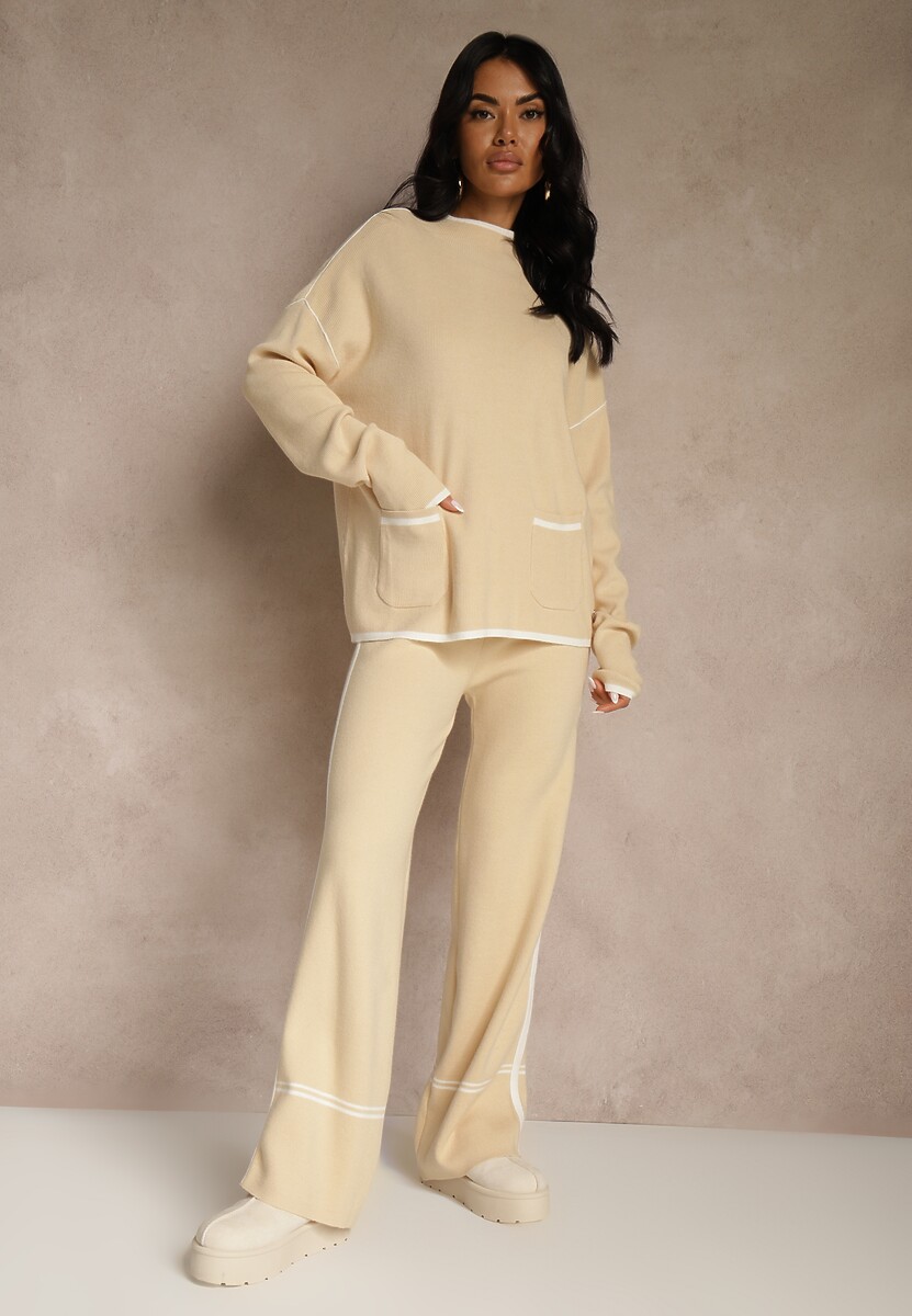 Jasnobeżowy Komplet Dzianinowy Sweter i Spodnie o Szerokim Kroju Ozdobione Lamówką Wedara