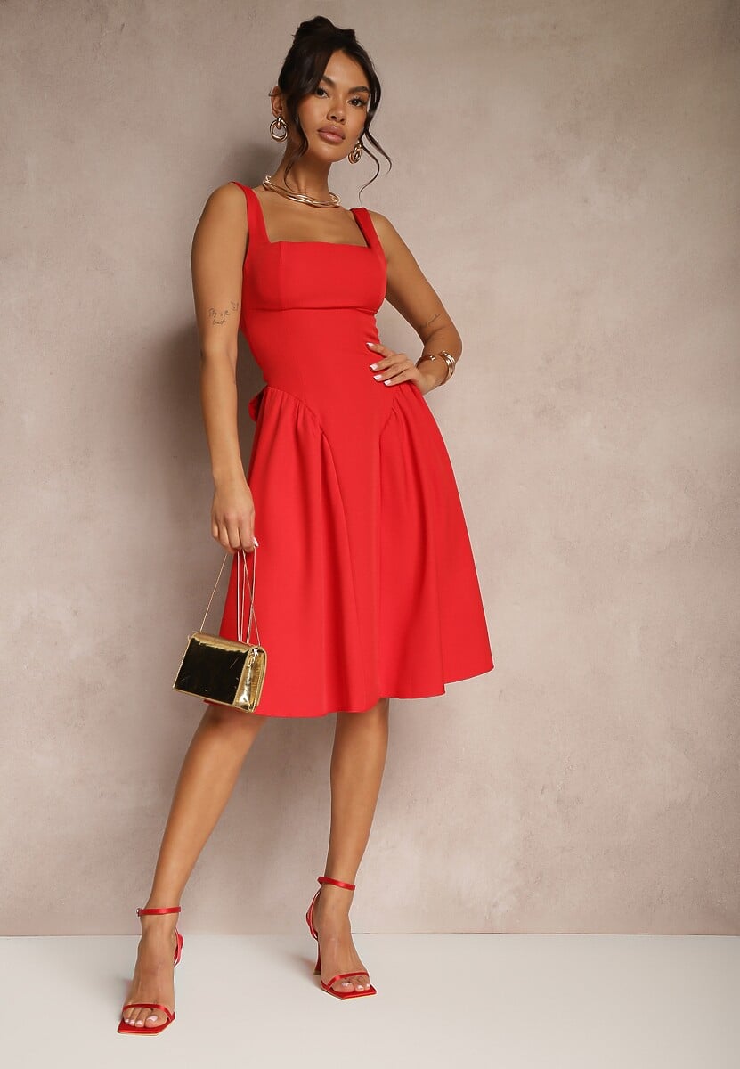 Niebieska Sukienka o Rozkloszowanym Fasonie z Kokardą na Tyle Soneritia