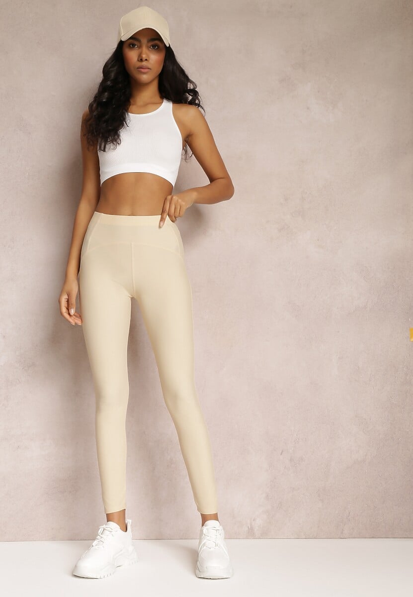 Jasnobeżowe Legginsy Hyraste
