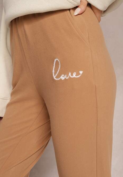 Beżowe Spodnie Dresowe z Regularną Talią ze Ściągaczami i Haftowanym Napisem Botalina