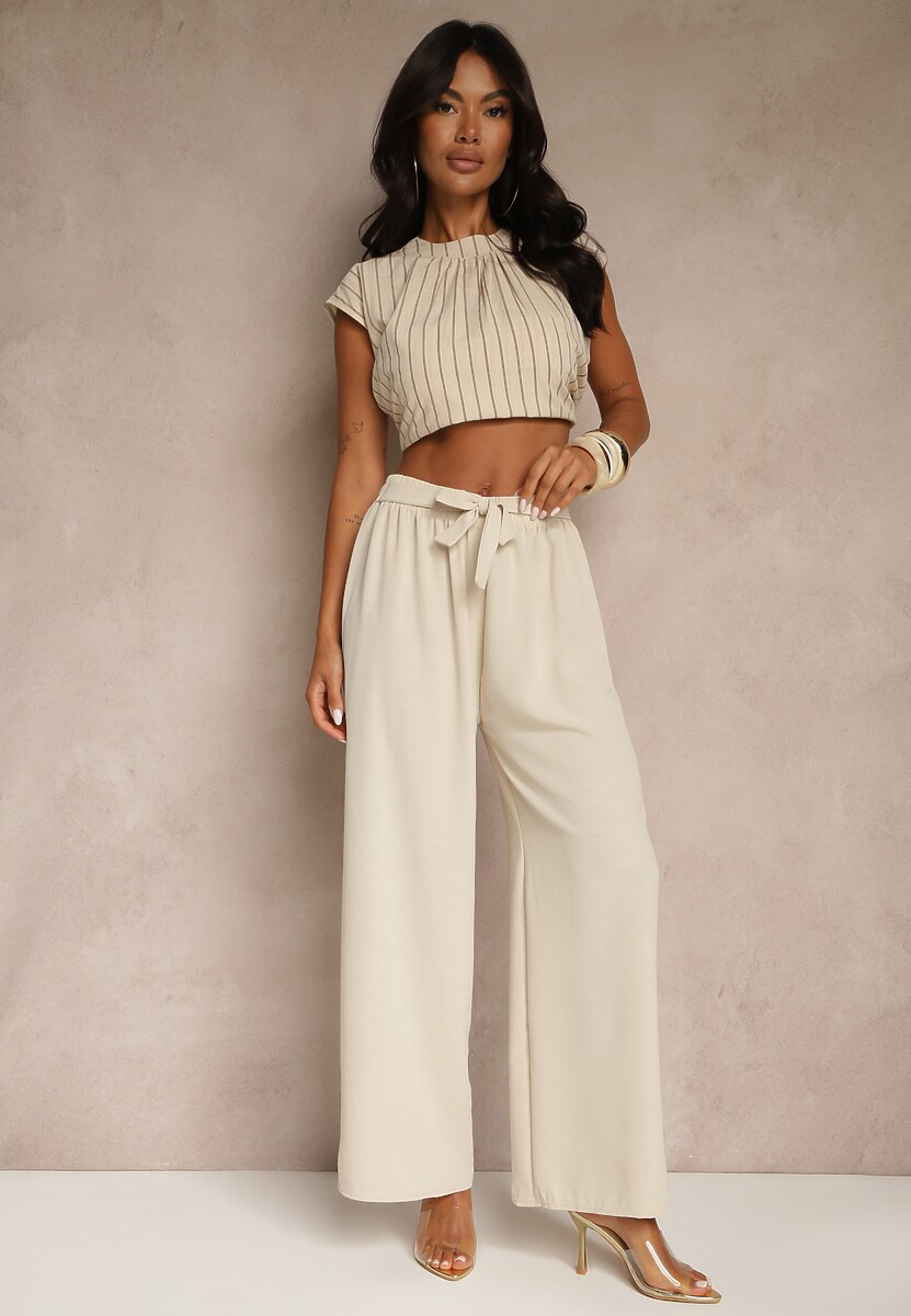 Jasnobeżowe Spodnie z Szerokimi Nogawkami i Doszytym Paskiem w Talii Atita