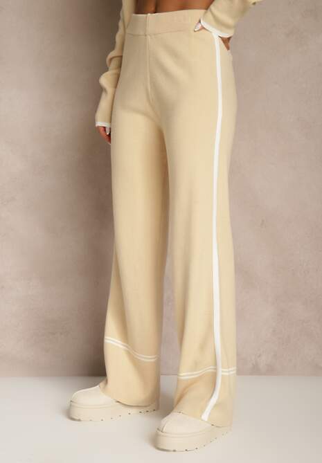 Jasnobeżowy Komplet Dzianinowy Sweter i Spodnie o Szerokim Kroju Ozdobione Lamówką Wedara