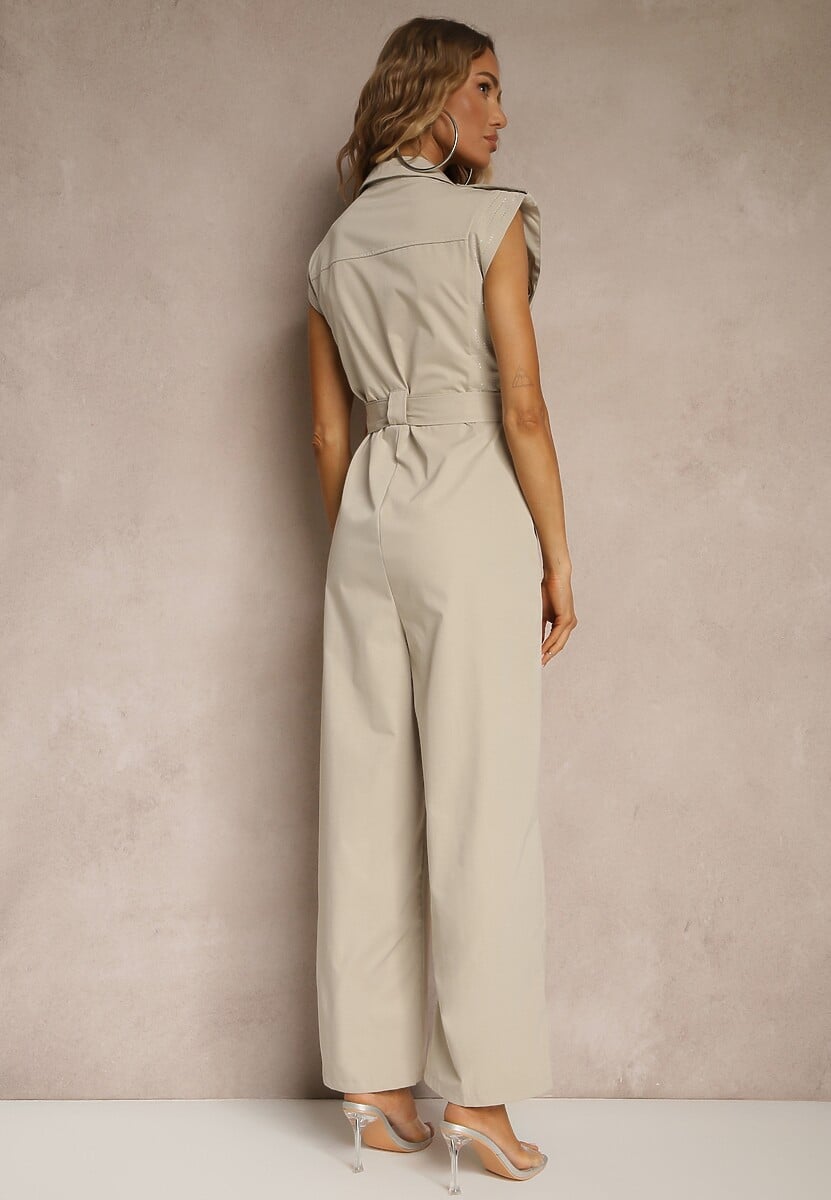 Beżowy Kombinezon Taliowany Ozdobiony Cyrkoniami i Guzikami Lumevarae