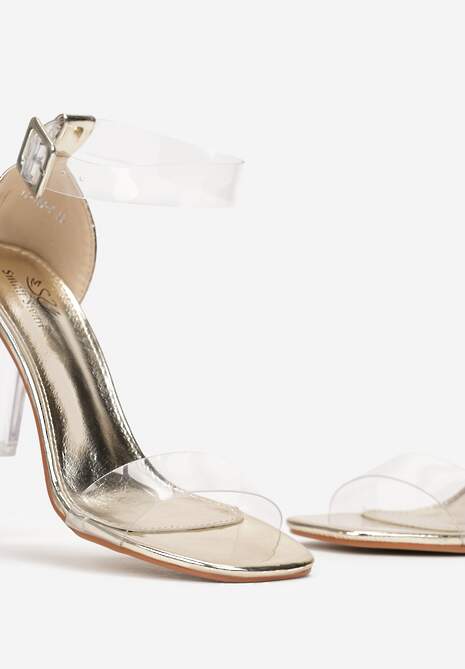Złote Sandały na Przezroczystym Słupku z Transparentnym Paskiem i Sprzączką Obemia