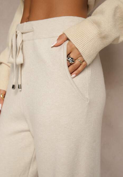 Jasnobeżowe Szerokie Spodnie Dzianinowe Ozdobione Sznurkami Meretusa