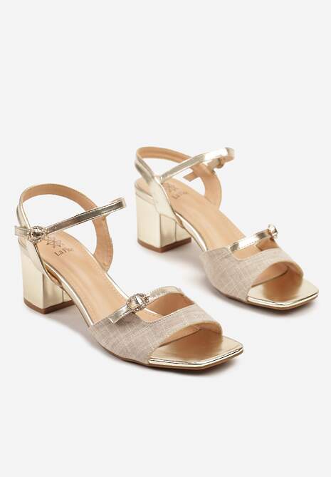 Złote Sandały na Słupku Ozdobione Cyrkoniową Klamrą i Wycięciami Tellisca