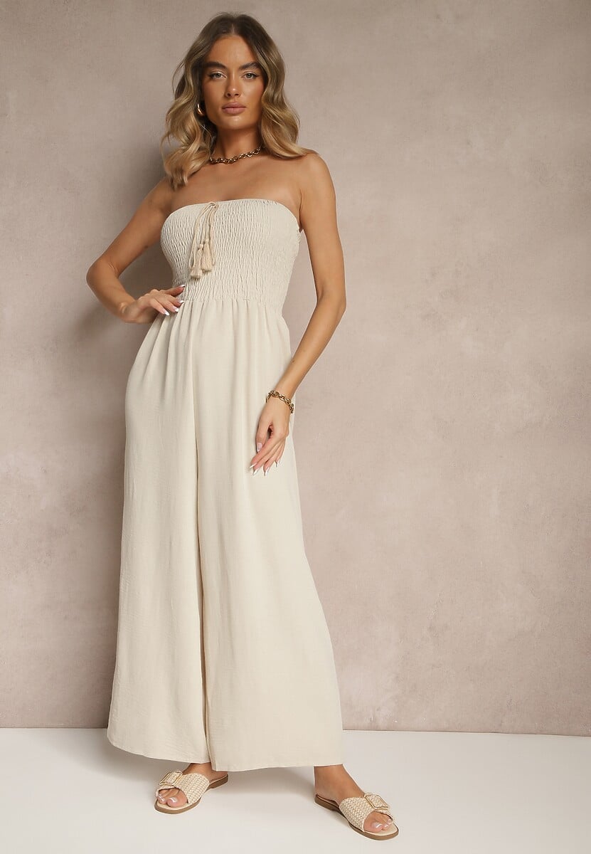 Jasnobeżowy Kombinezon Bandeau z Szeroką Nogawką Zdobiony Frędzlami Dovaira