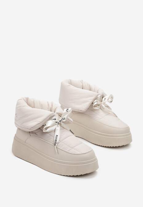 Beżowe Śniegowce z Ozdobną Wstążką Wokół Kostki Rohessi