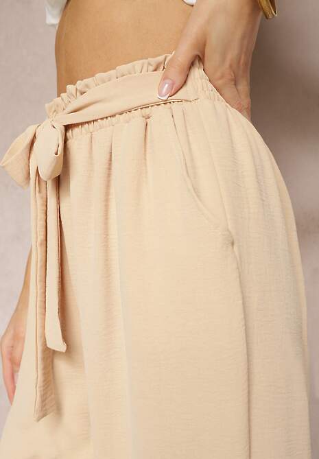 Beżowe Spodnie High Waist Wiązane w Pasie Wykończone Gumką w Talii Dimixi