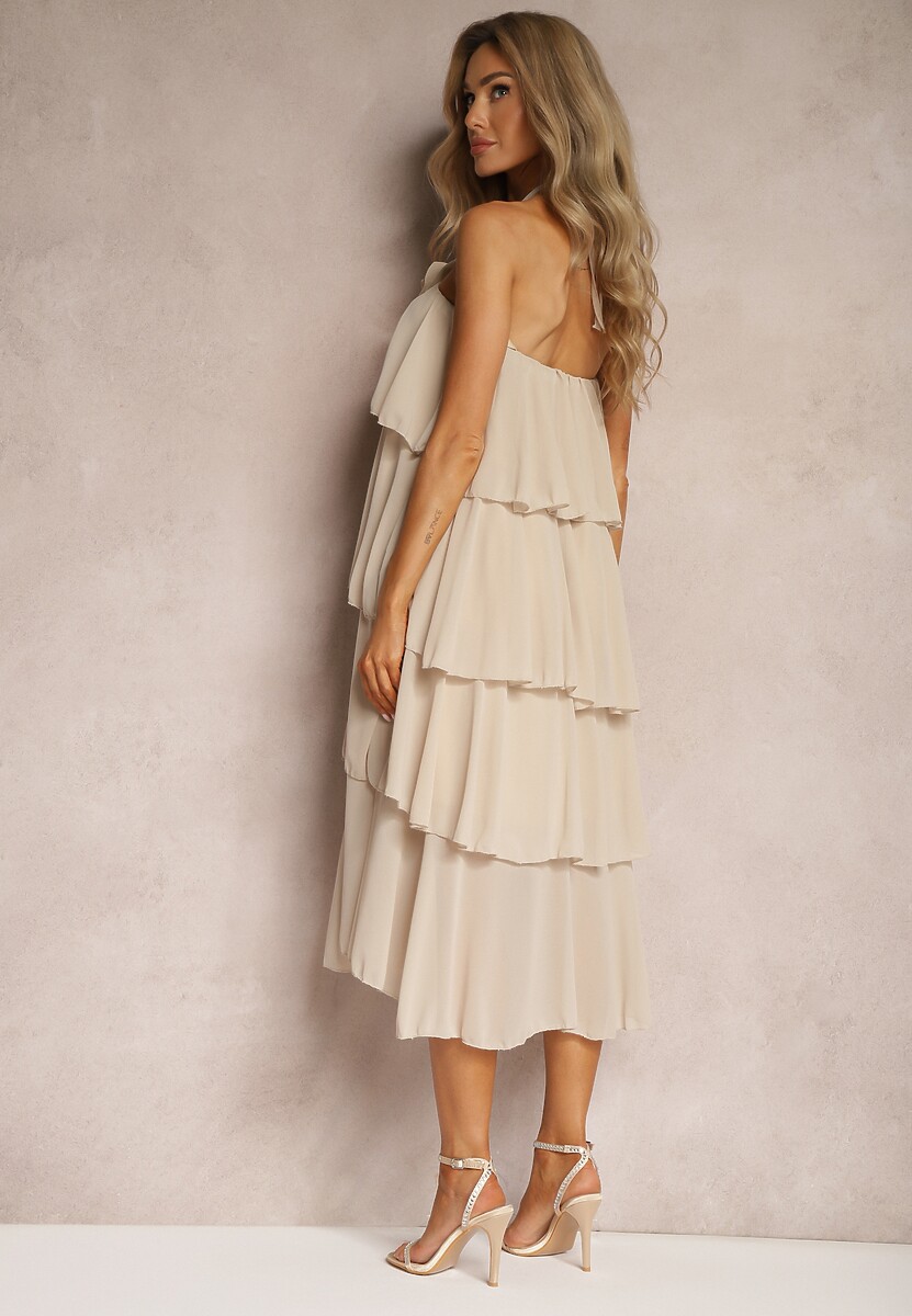 Beżowa Sukienka z Kwiatową Broszką Wykończona Falbanami i Wiązaniem na Szyi Tinashell