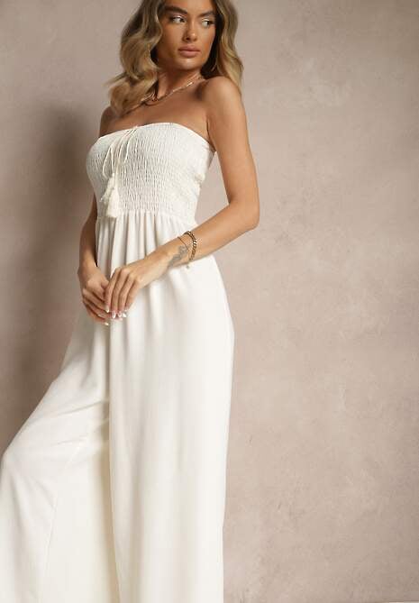 Jasnobeżowy Kombinezon Bandeau z Szeroką Nogawką Zdobiony Frędzlami Dovaira