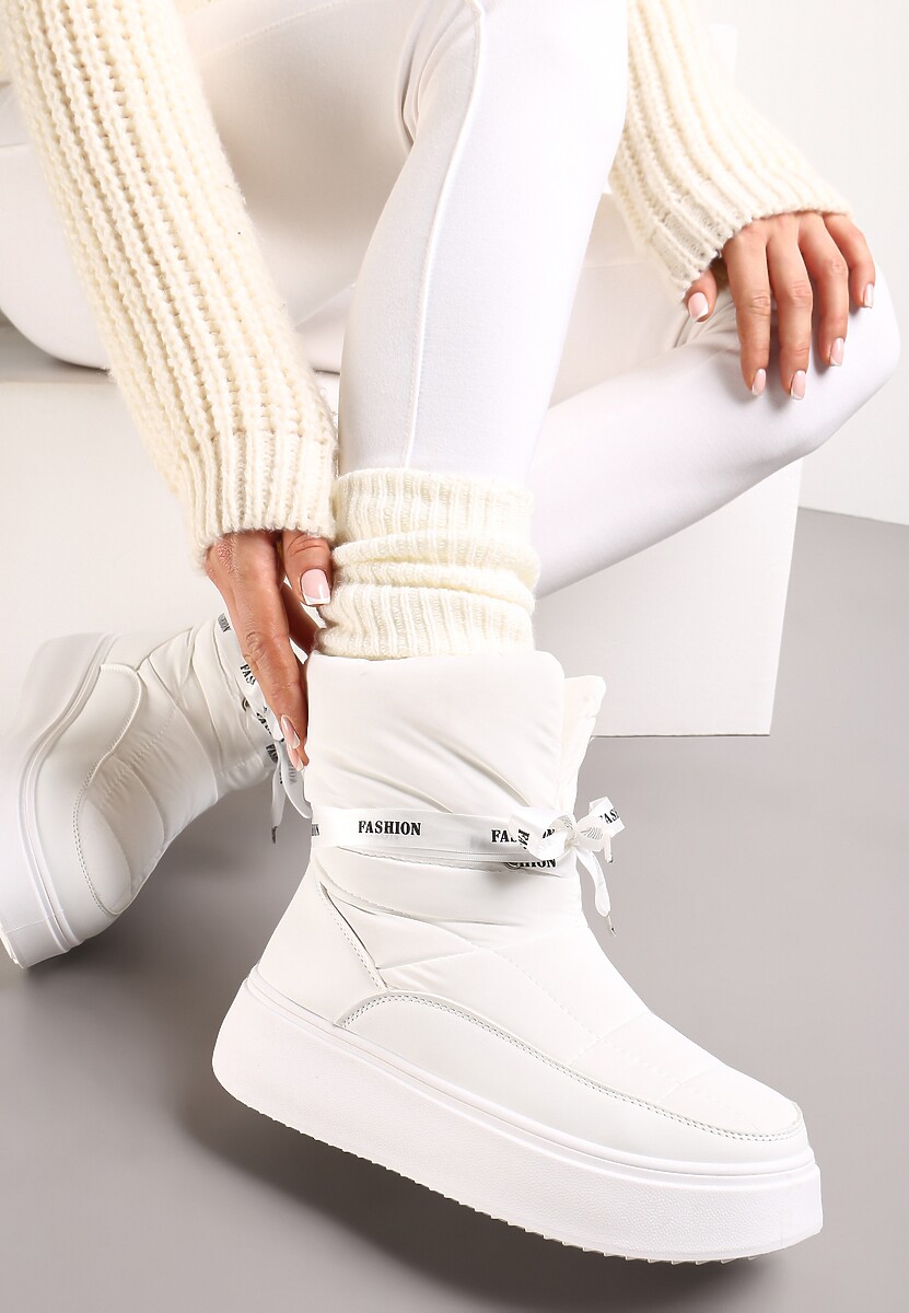 Beżowe Śniegowce z Ozdobną Wstążką Wokół Kostki Rohessi