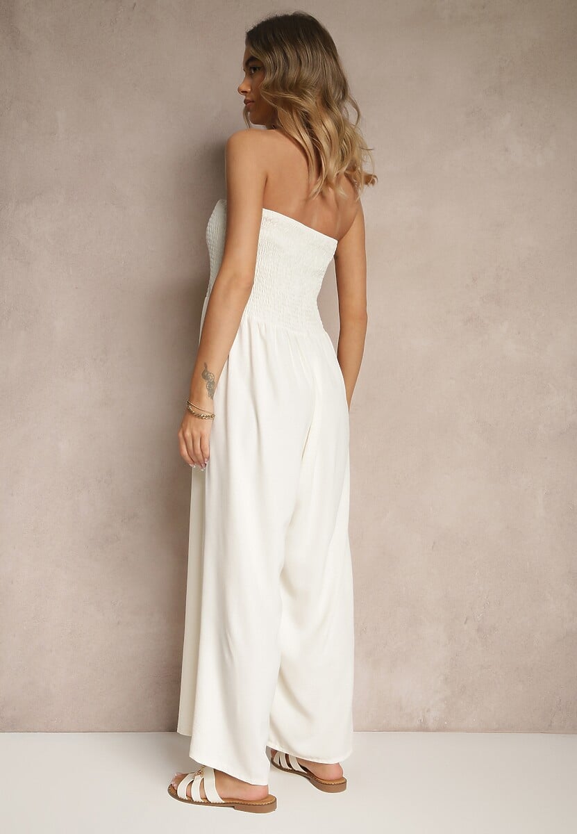 Jasnobeżowy Kombinezon Bandeau z Szeroką Nogawką Zdobiony Frędzlami Dovaira