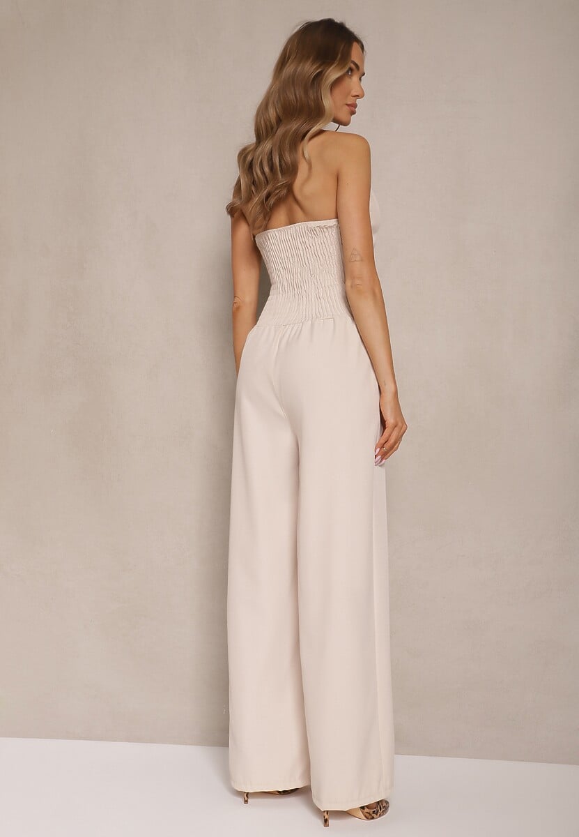 Beżowy Kombinezon na Szyję z Guzikami i Szerokimi Nogawkami Tadelli