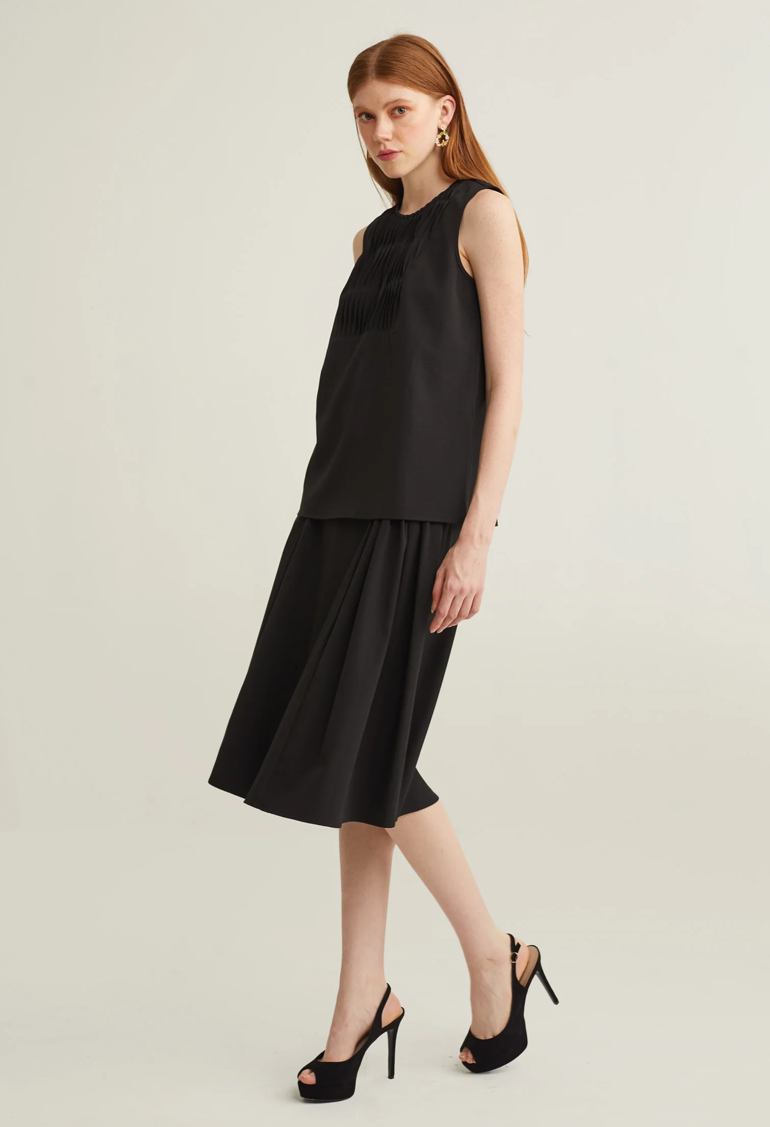 Twist Pleated Umbrella Midi Skirt