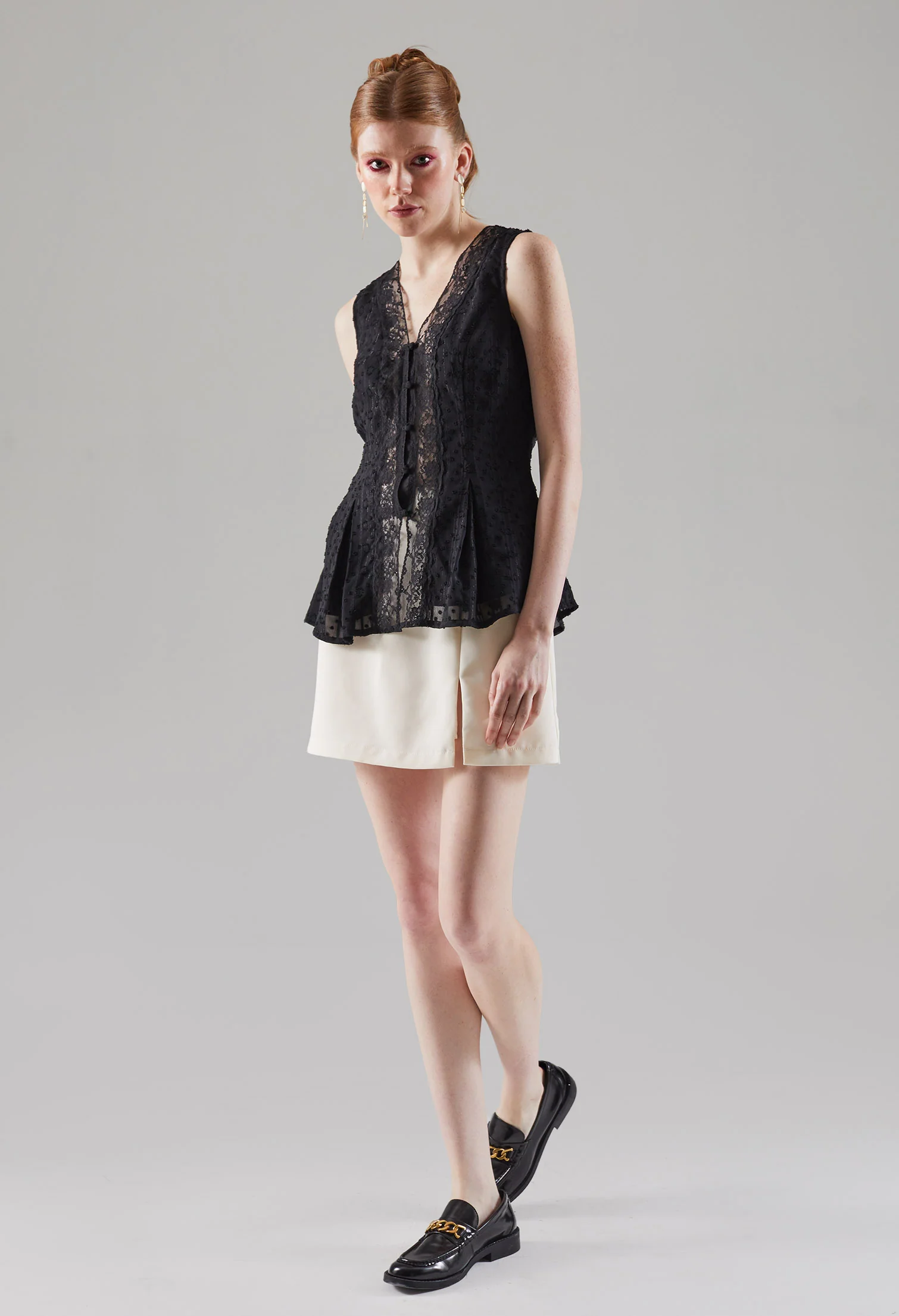 Flared Waistline Sleeveless Top