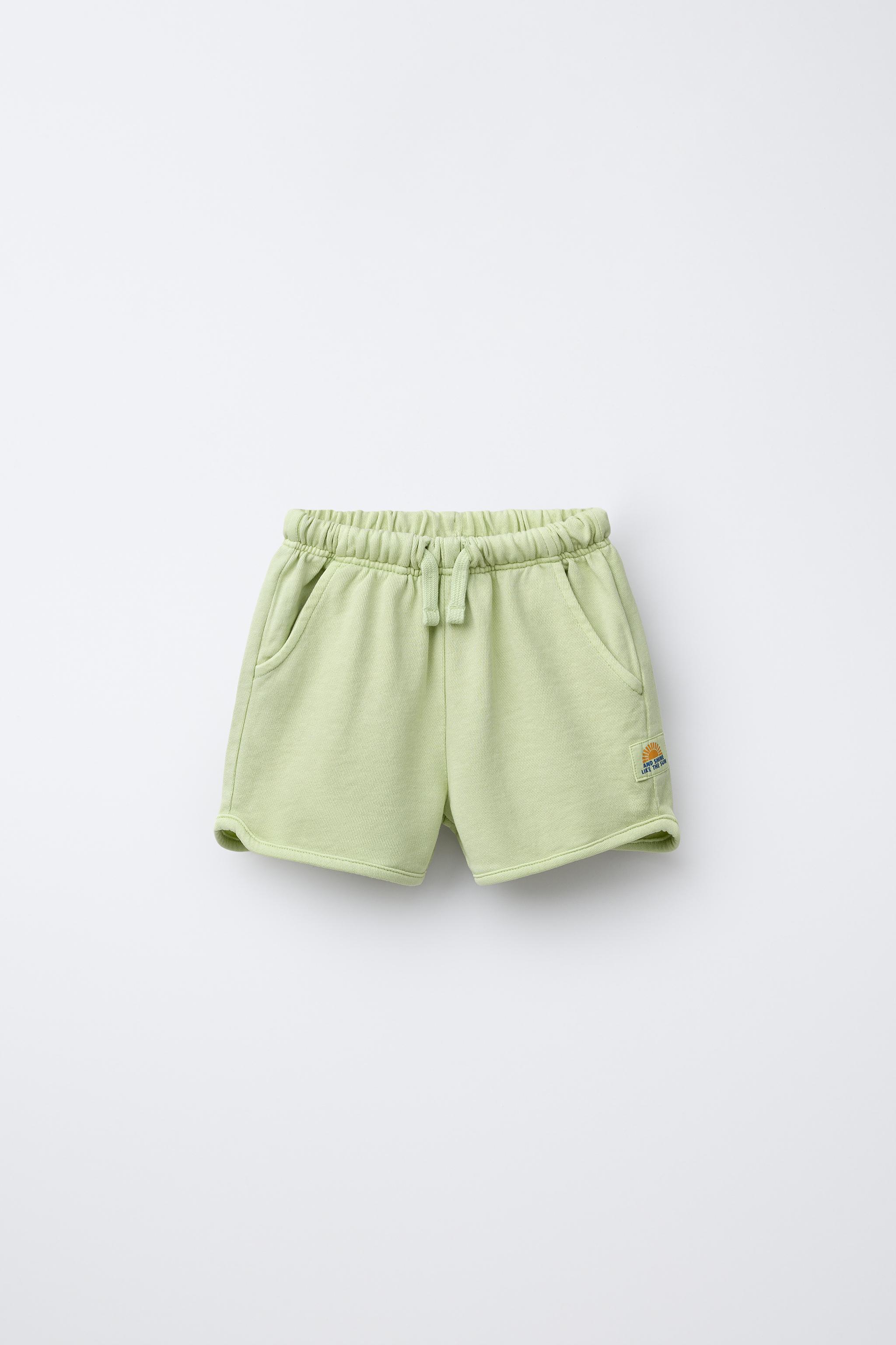 STRAIGHT GARMENT DYE LABEL PLUSH SHORTS