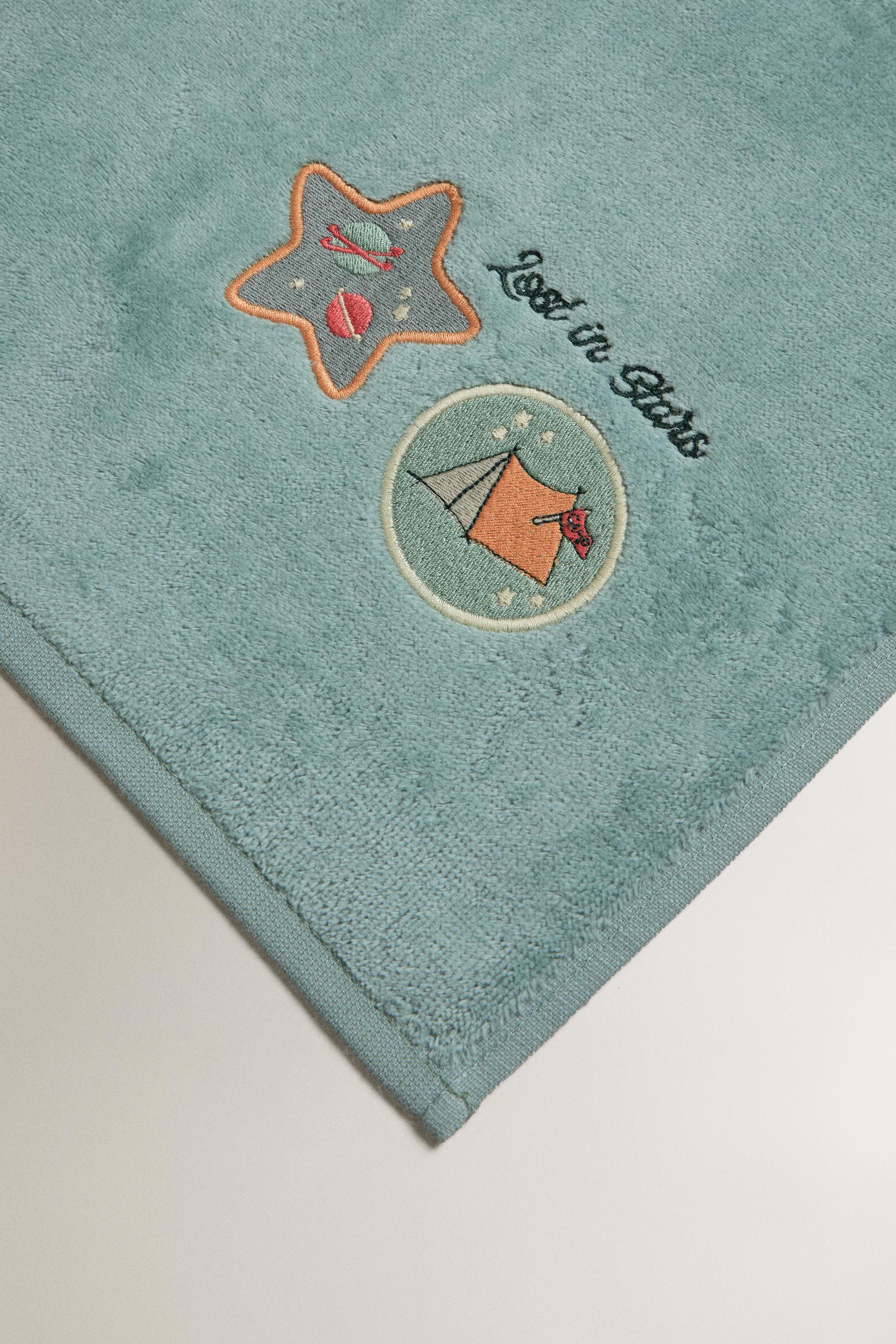 CHILDREN'S VELOUR TOWEL WITH SPACE PATCHES