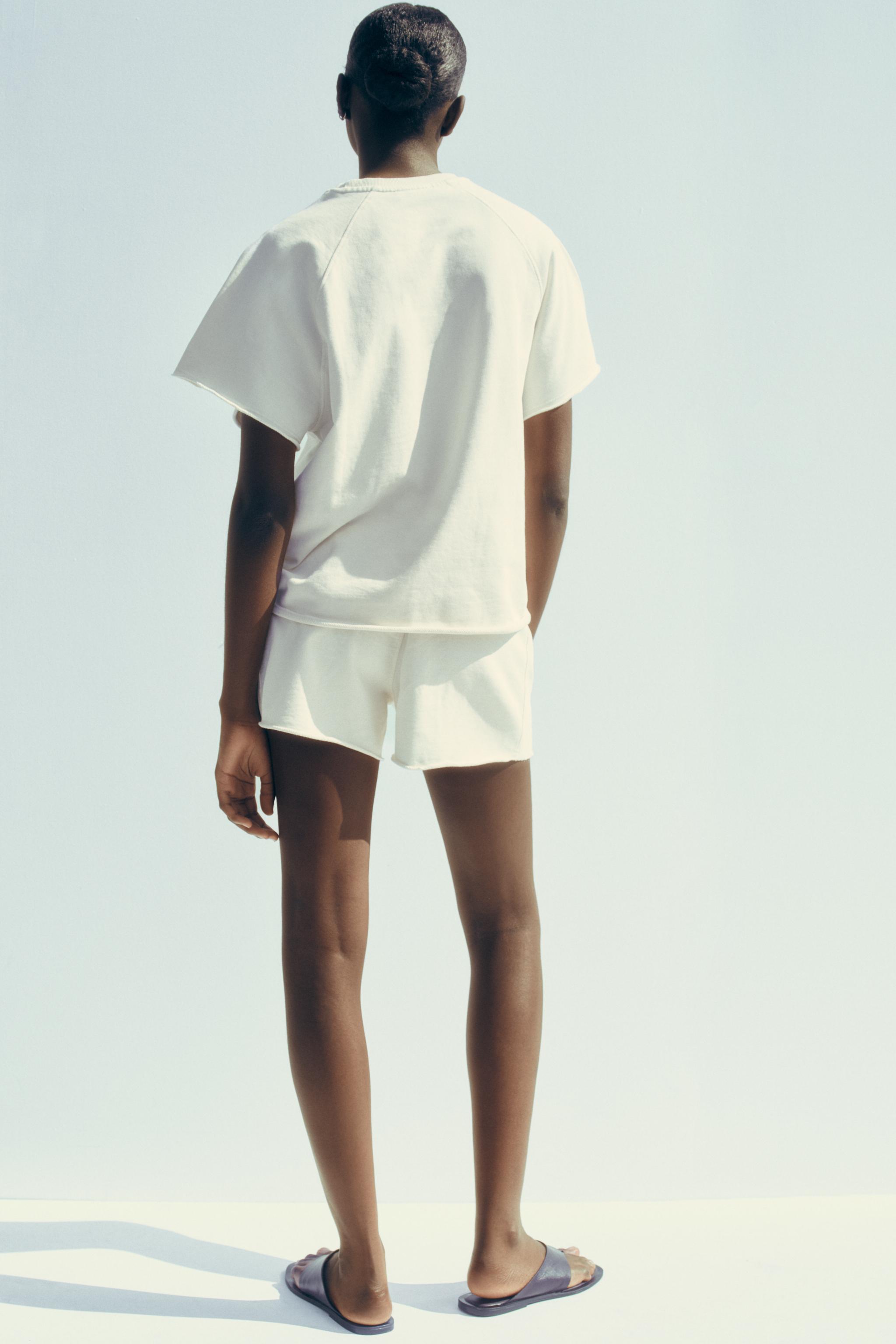 WASHED EFFECT TEXT PLUSH SWEATSHIRT