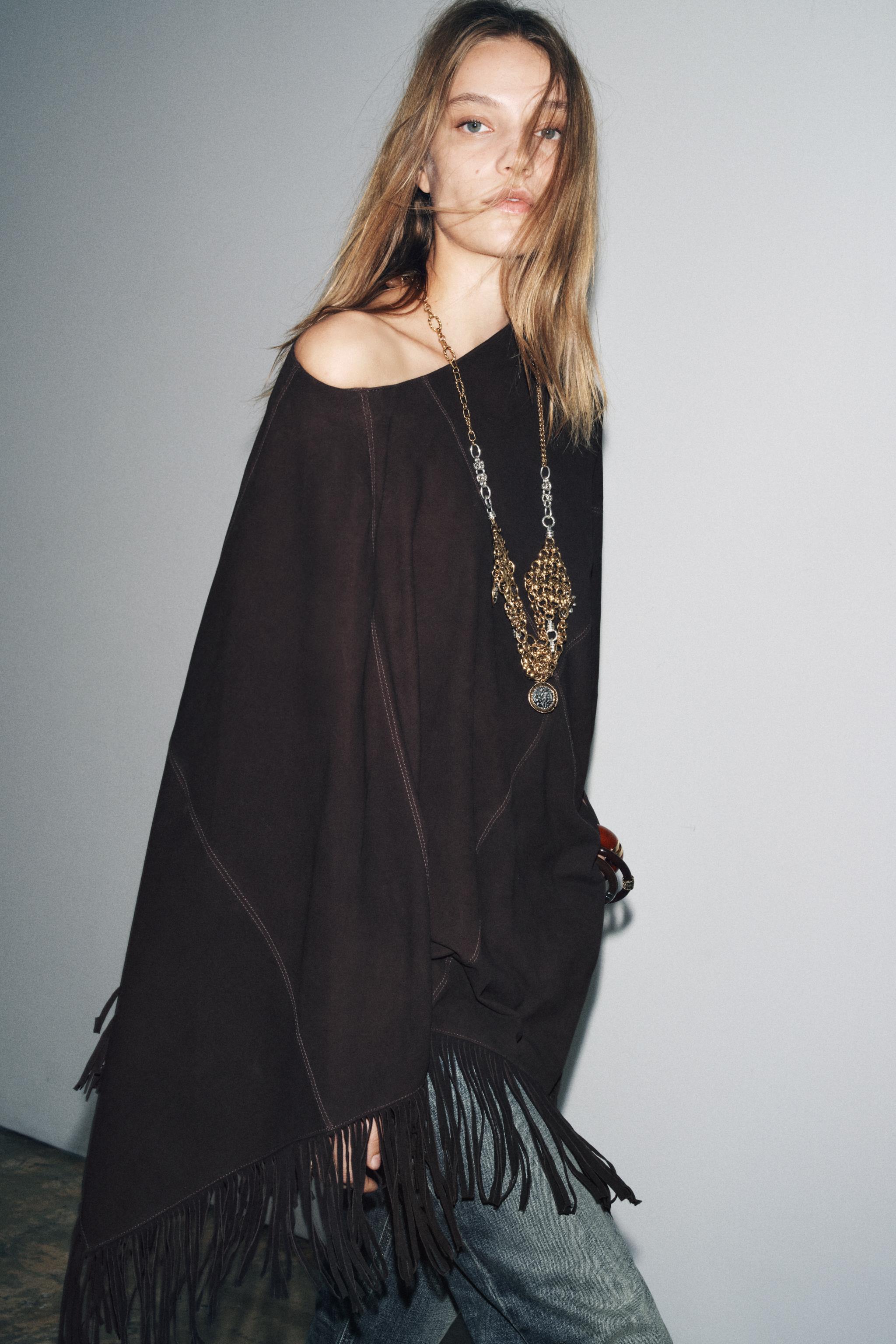 LEATHER FRINGE CAPE