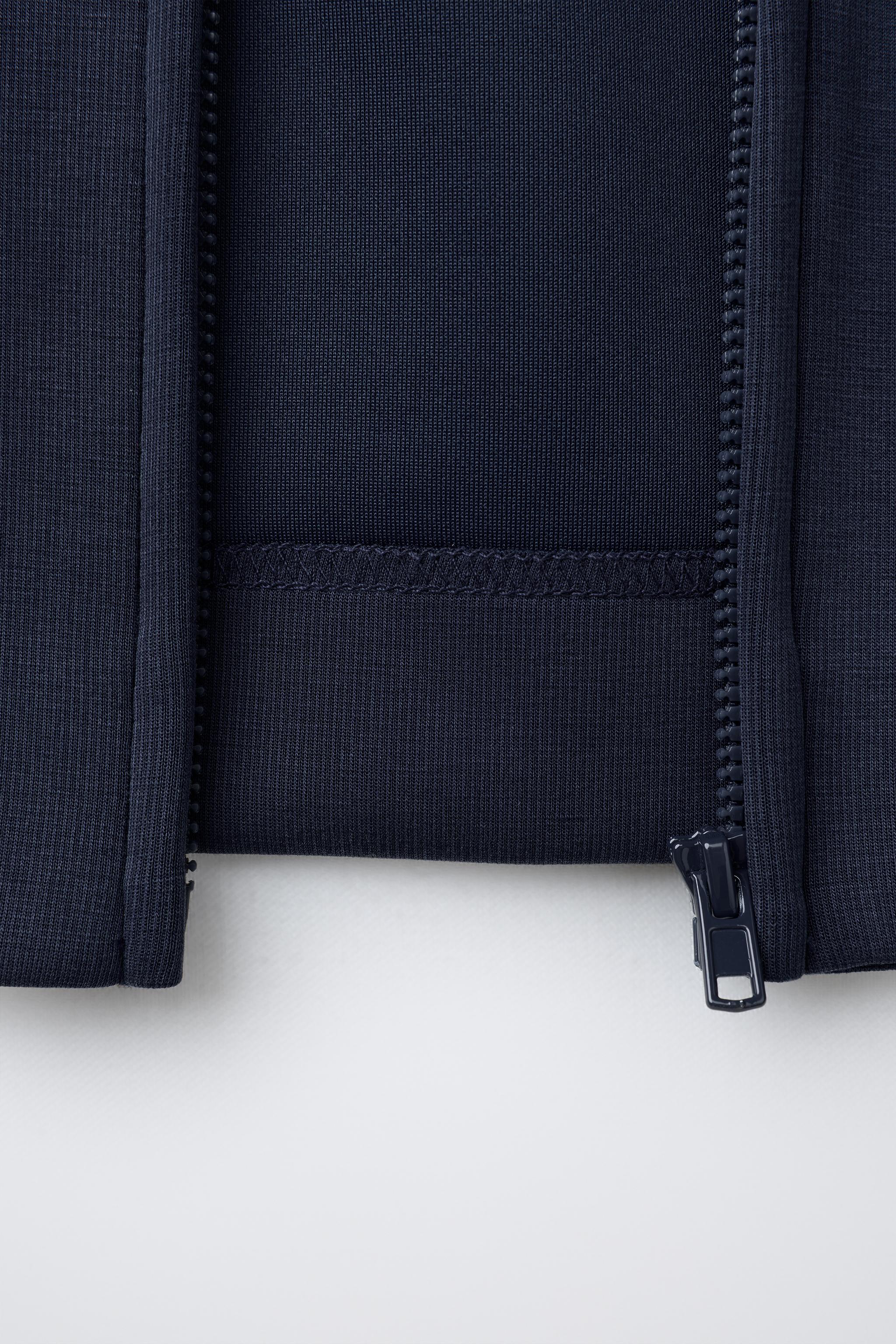 EMBOSSED TEXT HOODIE JACKET