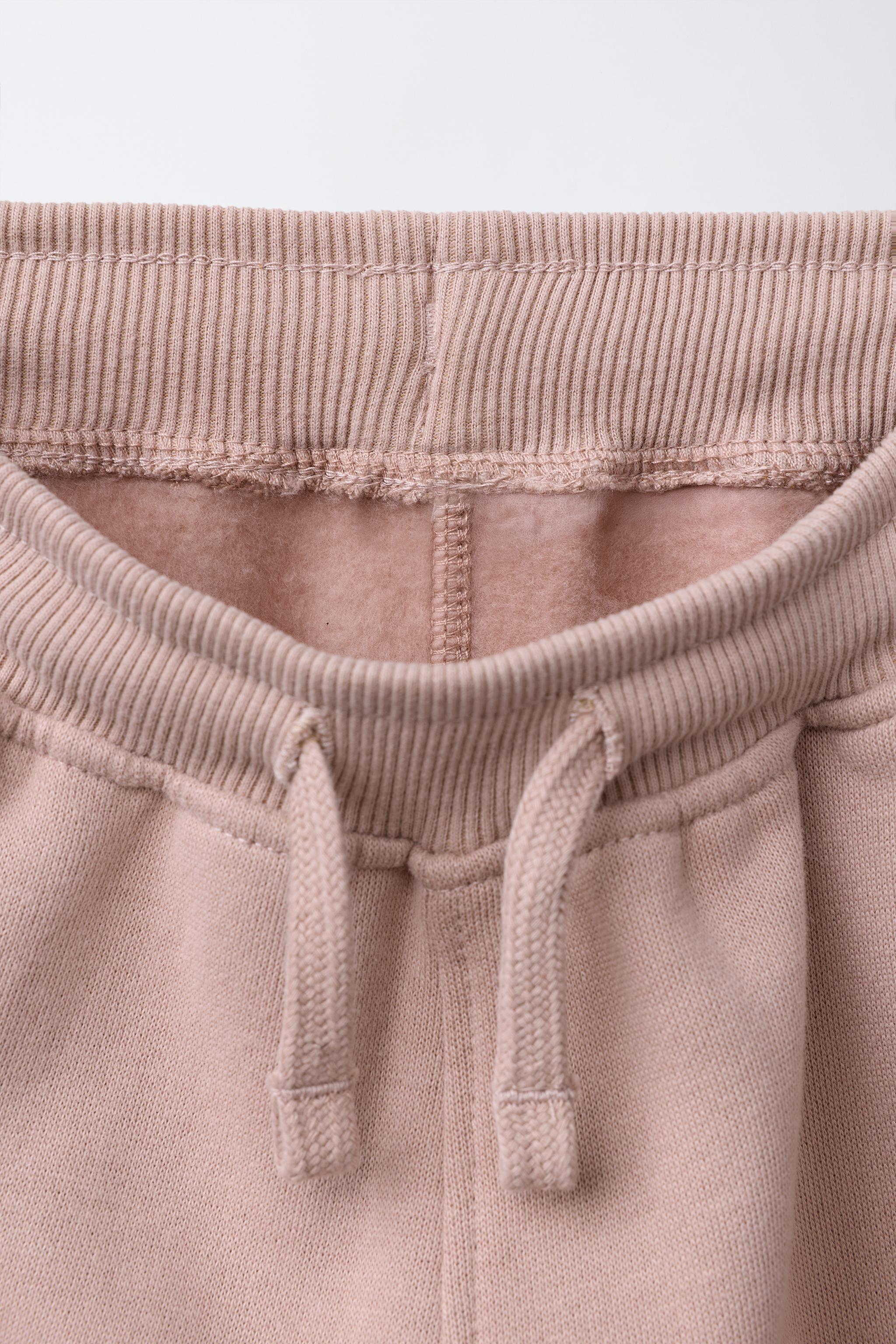 FLOCKED LOGO JOGGER PANTS