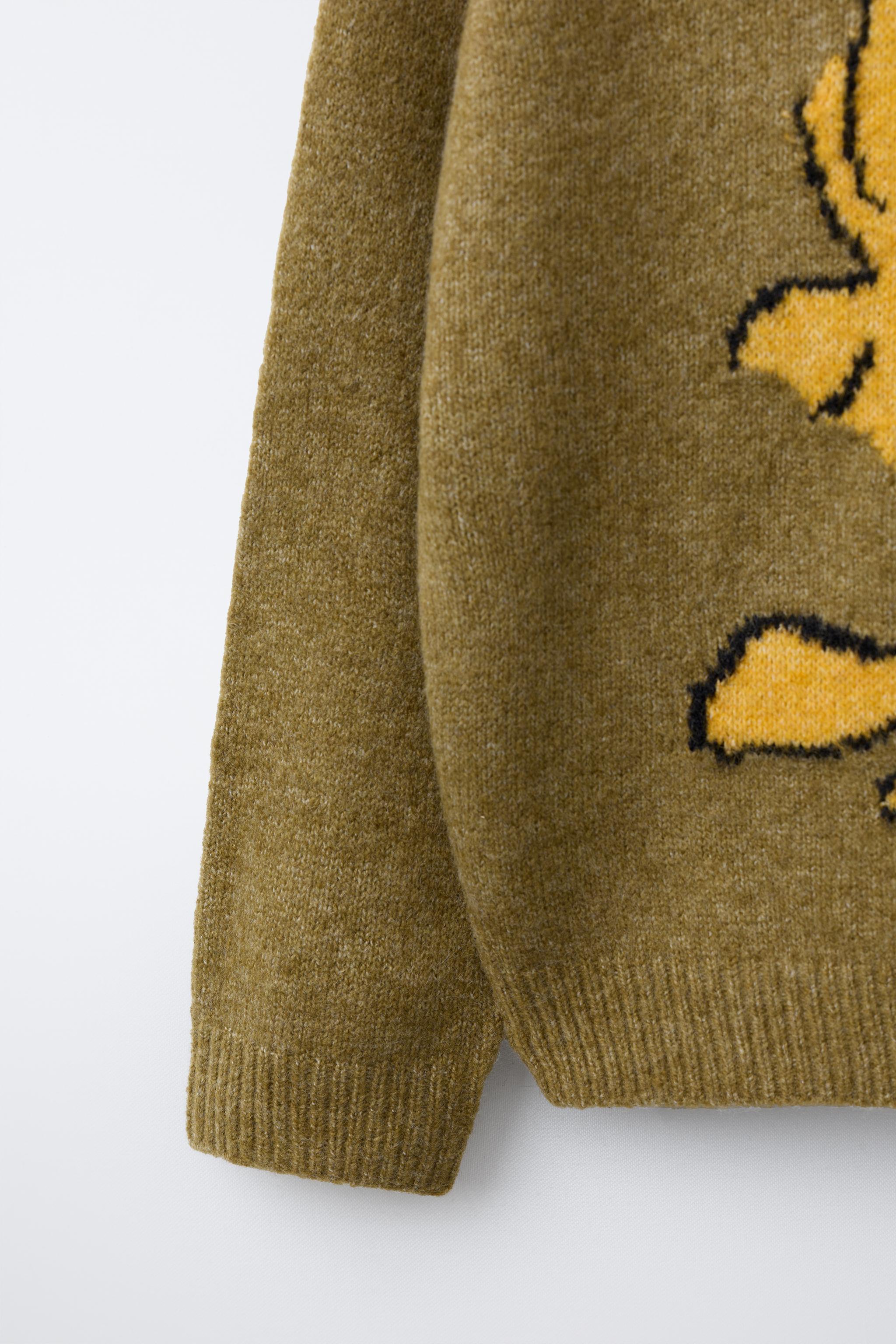 SNOOPY PEANUTS™ KNIT SWEATER