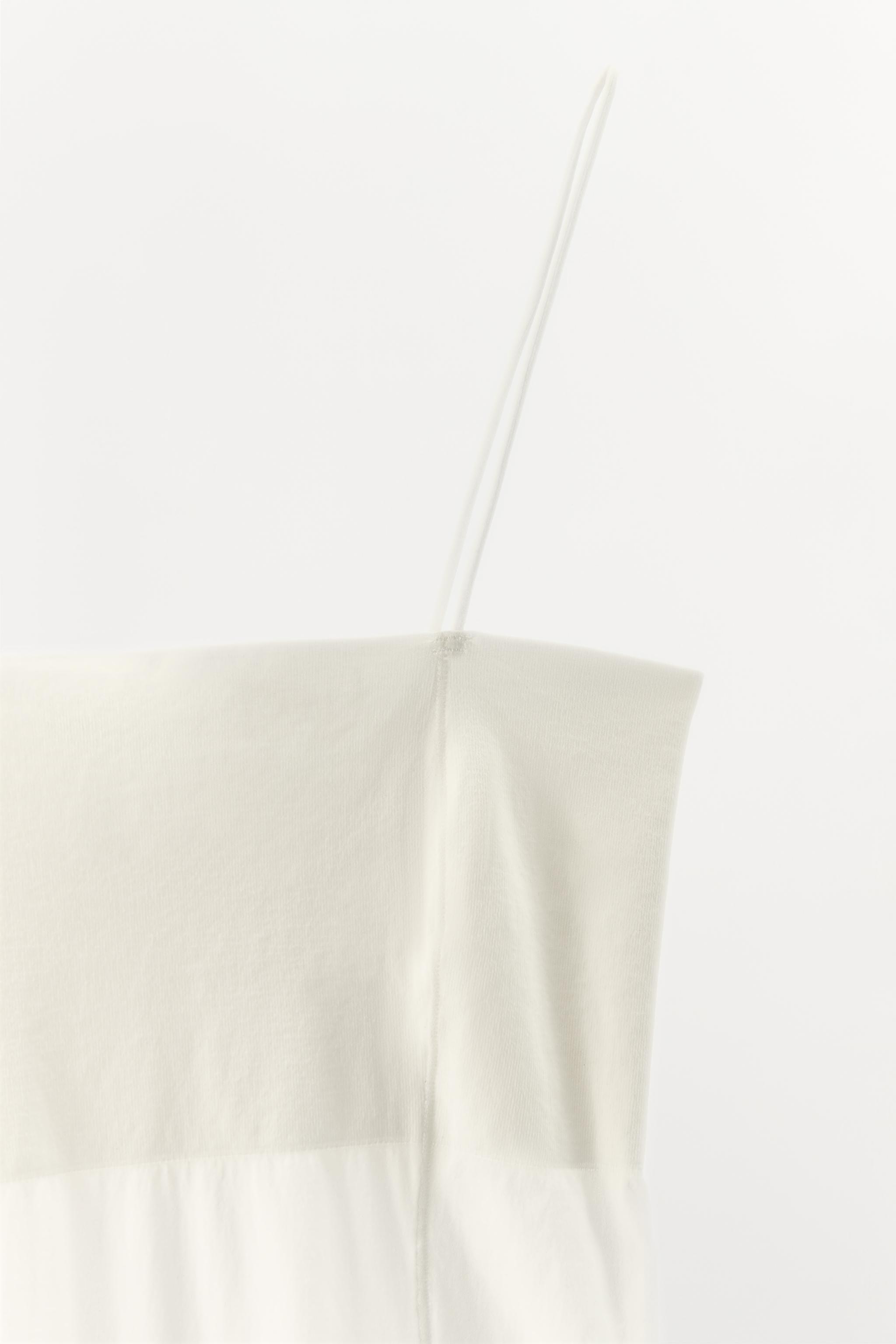 FITTED STRAPPY BODYSUIT WITH SEAMS