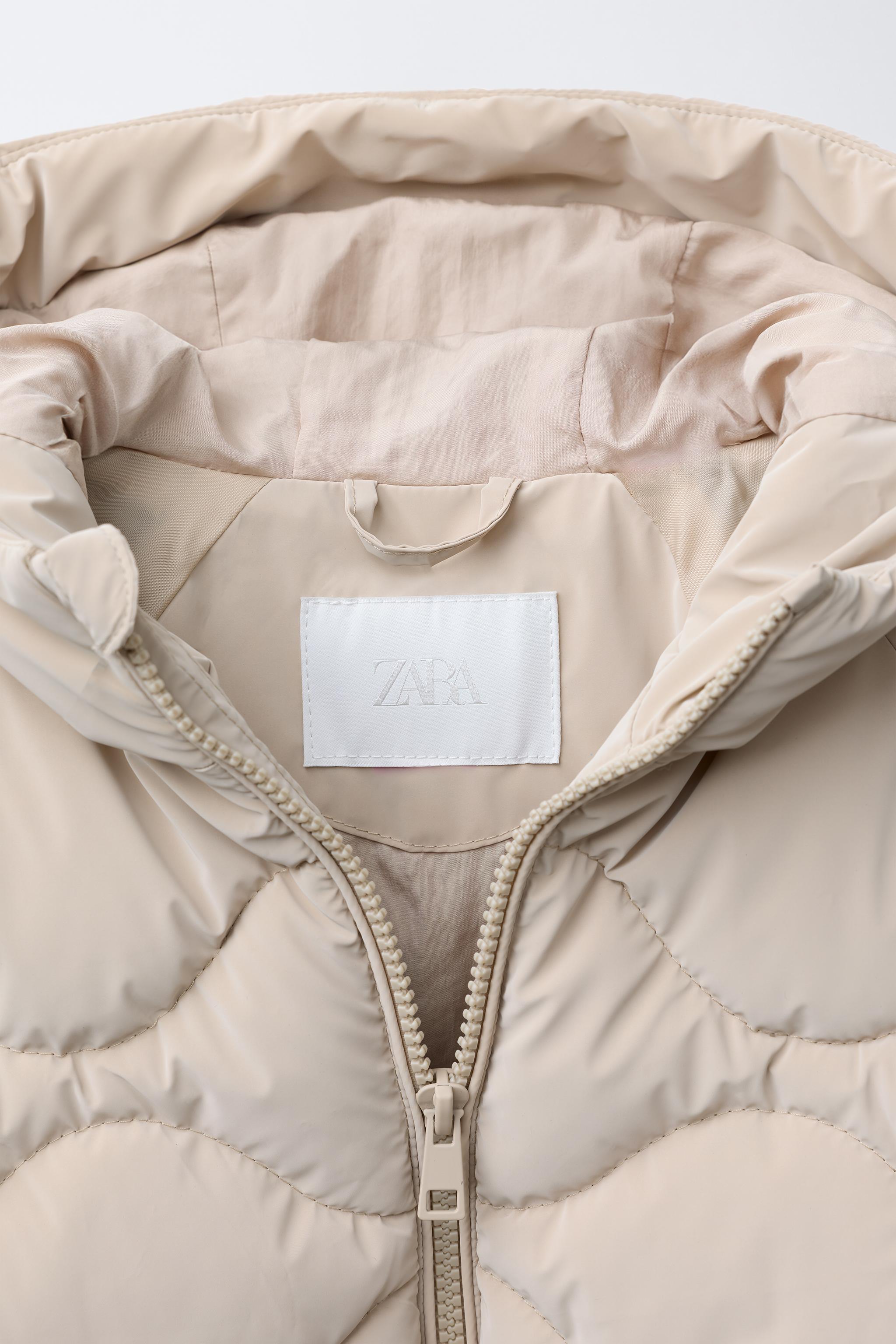 ELASTICIZED PUFFER JACKET