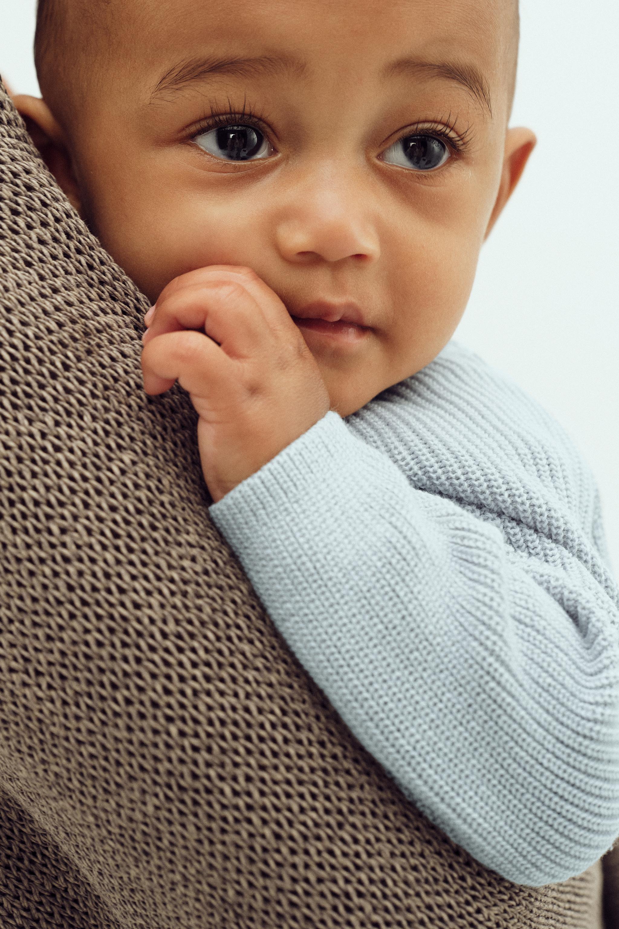 EMBROIDERED ELEPHANT PURL KNIT SWEATER