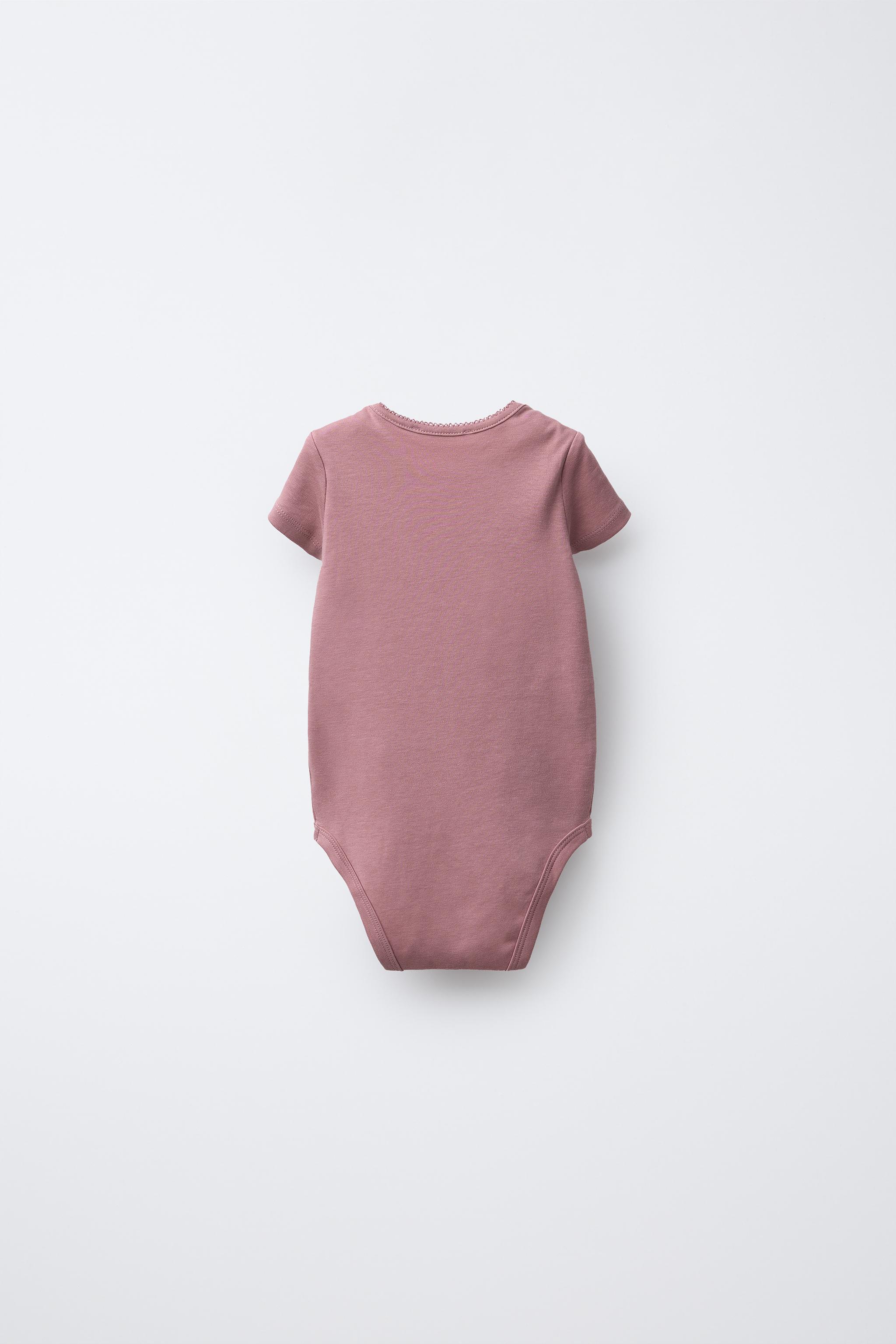 FIVE-PACK OF SWAN BODYSUITS