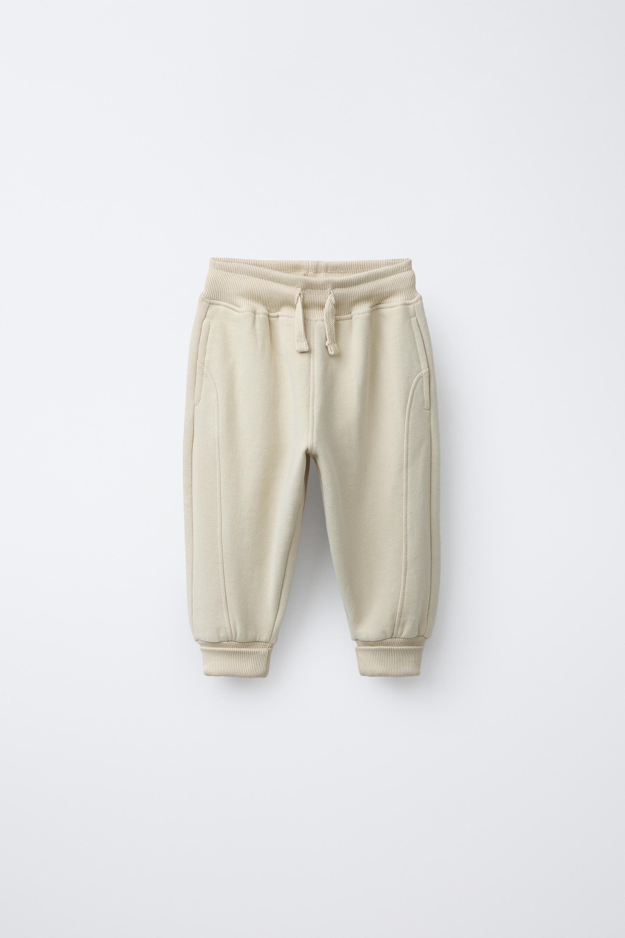 FLOCKED LOGO JOGGER PANTS