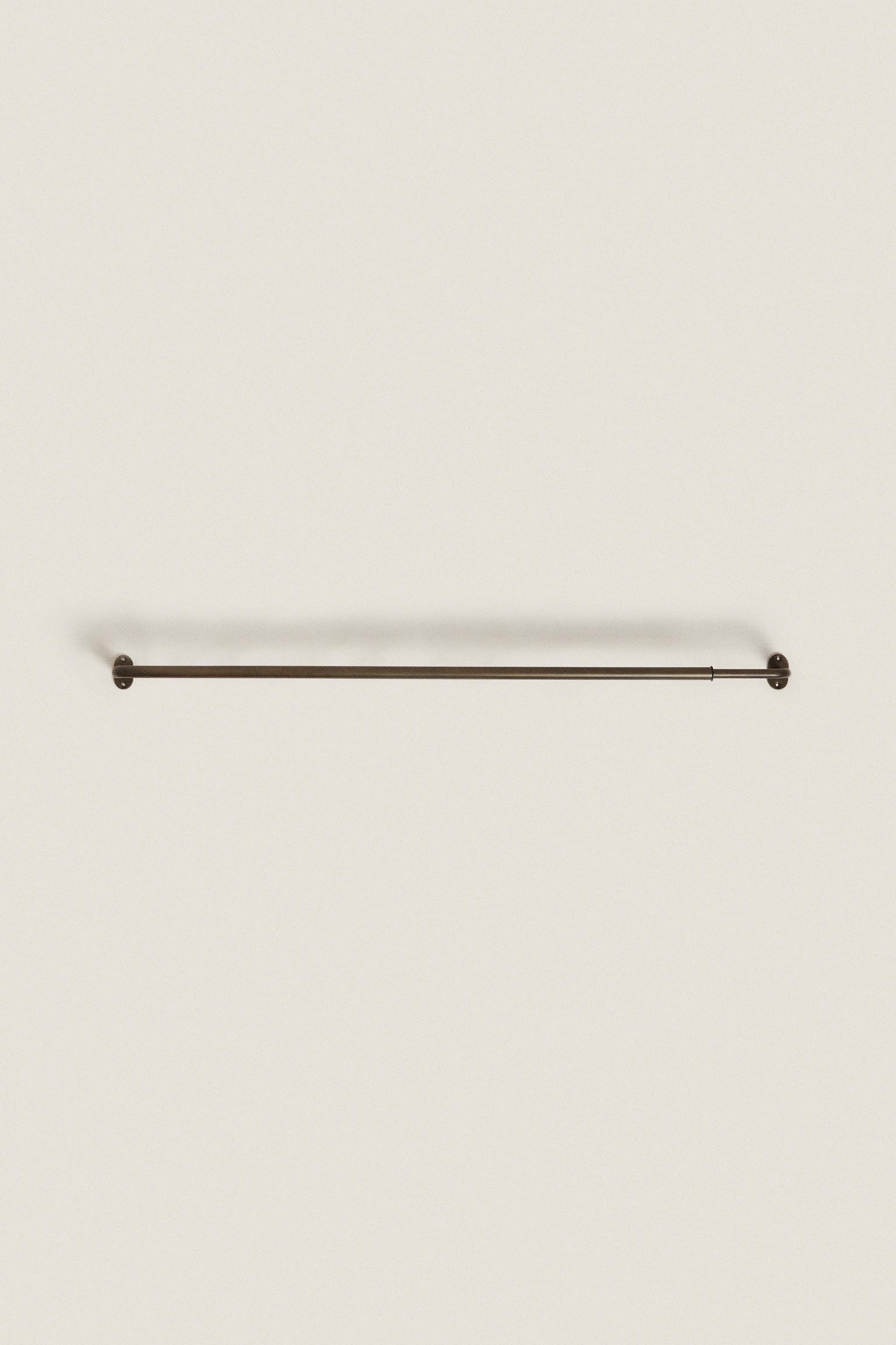 EXTENDIBLE METALLIC CURTAIN RAIL