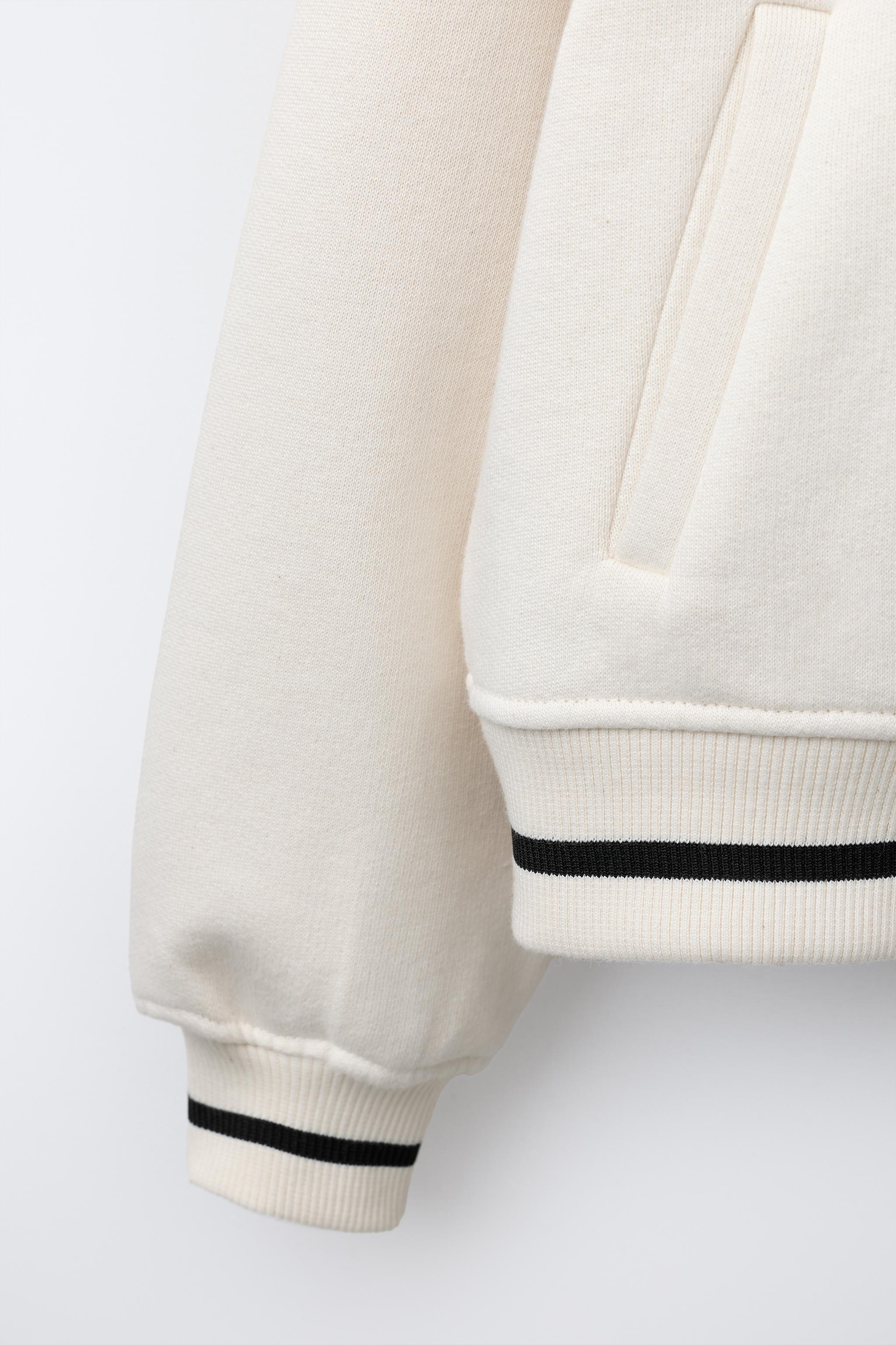 PLUSH BOMBER JACKET WITH EMBROIDERED TEXT